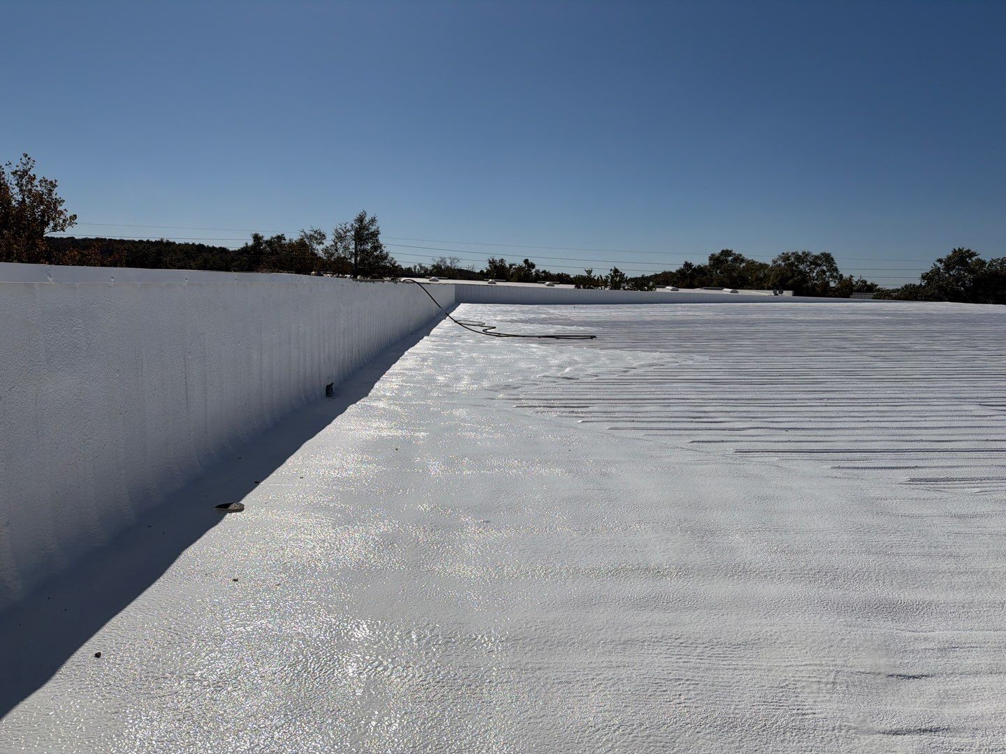 Orlando Commercial Metal Roof Restoration and Silicone Coating System by CES Roofing