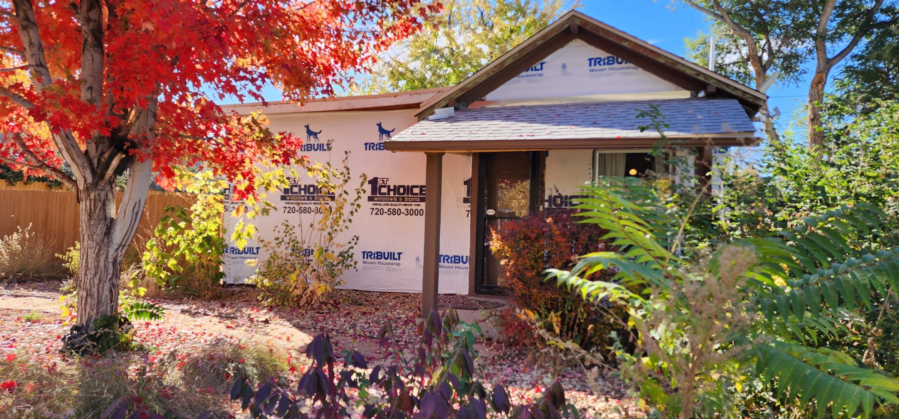 Beautiful little home in Denver receiving Lp Smartside Siding by 1st choice windows and siding