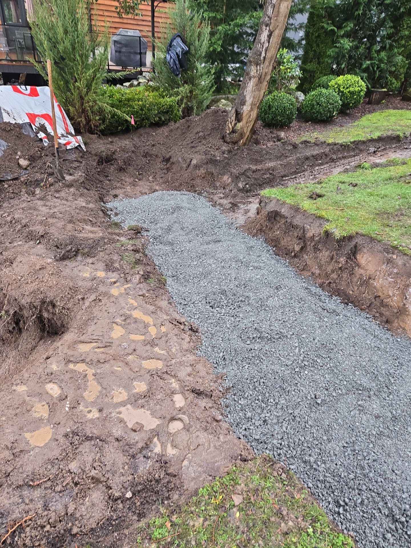 Coastal Landscape Restoration & Retaining Structure - In progress by Habanero Garden and Exterior Care