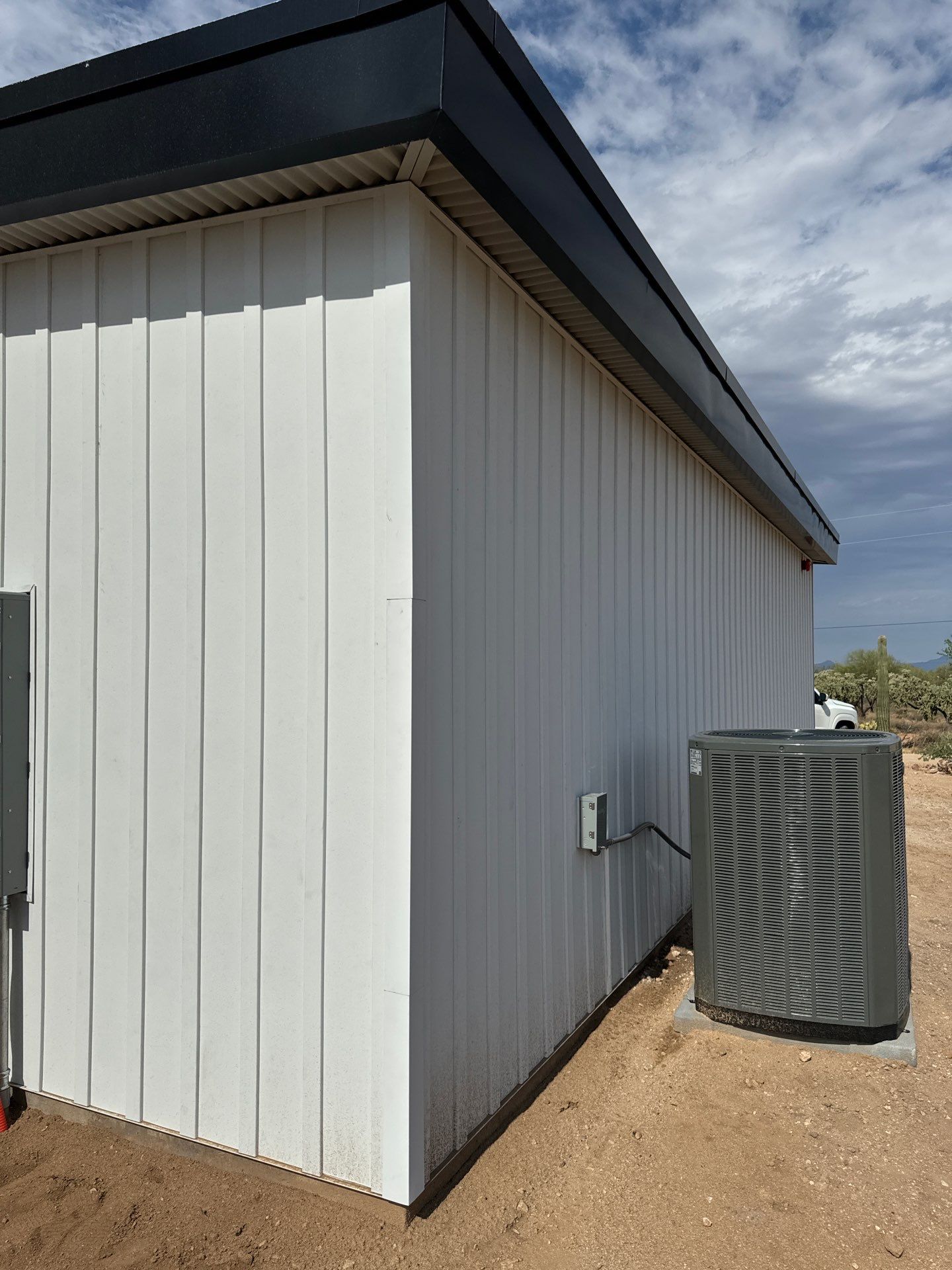 Polar White Metal Siding by Reimagine Roofing