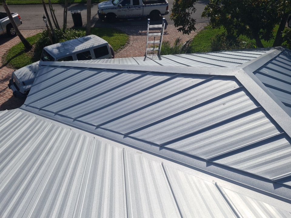 Residential Roofing Installation using 1" Nail strip metal roof by BLUES BROTHERS CONSTRUCTION CORP