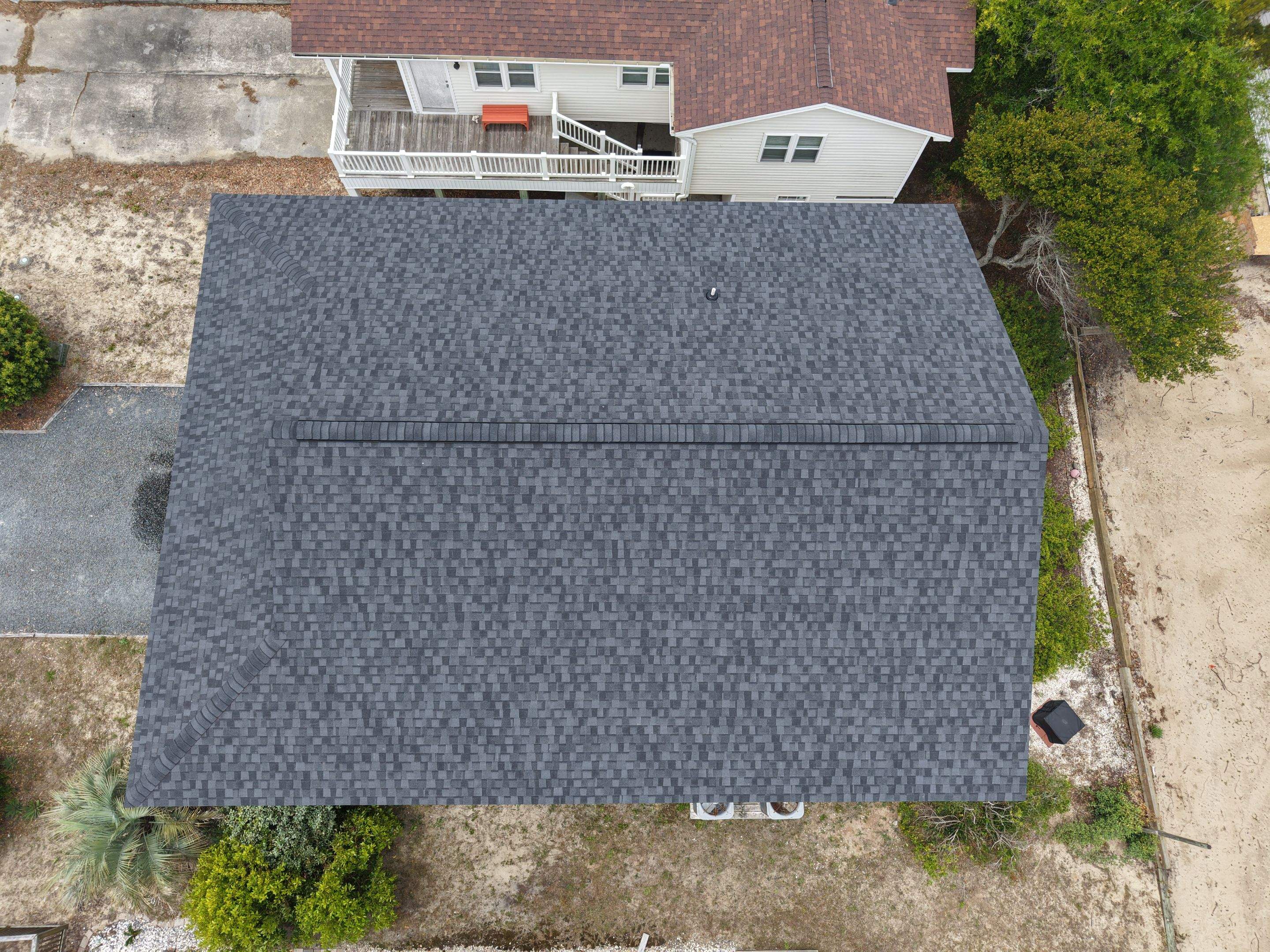 Oak Island Roof Replacement with CertainTeed Landmark PRO Moire Black by RGR Construction and Roofing, LLC