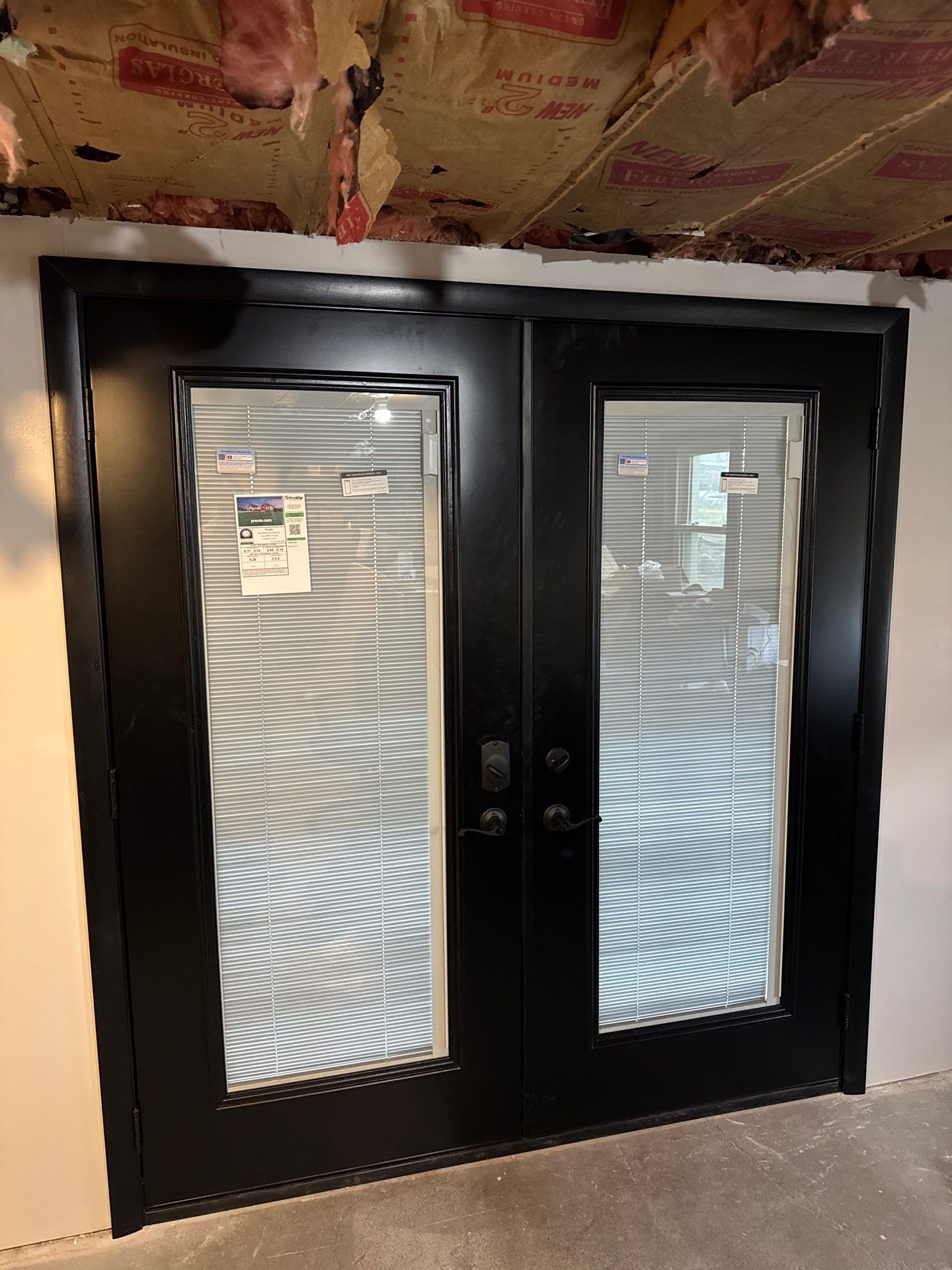 Metal Roofing, Board & Batten Siding, and Entry Door Transformation by Esh Builders