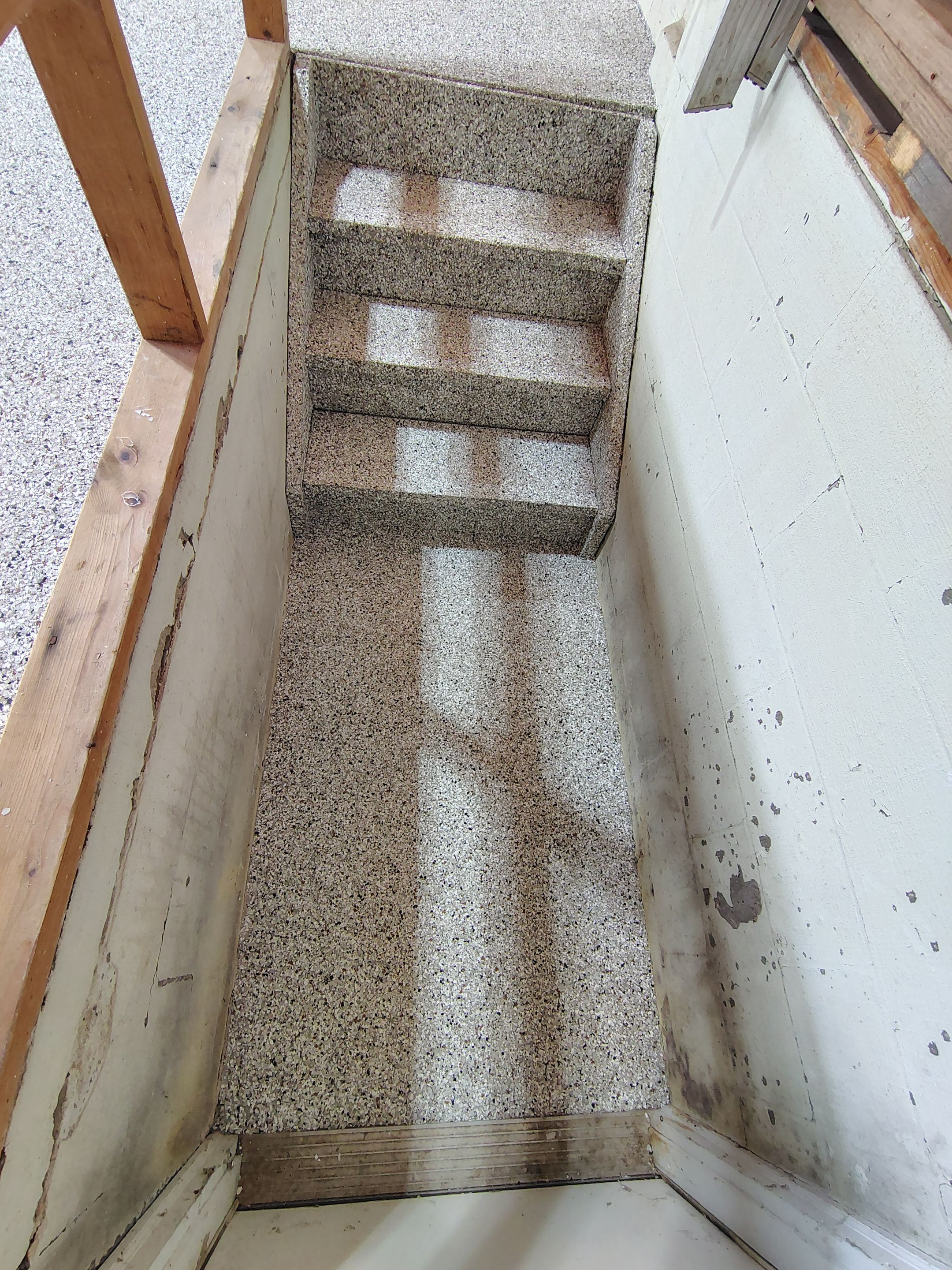 Sioux Falls Garage Epoxy Floor Installation and Concrete Crack Repair by Select Painting, Coatings & Garage Cabinets