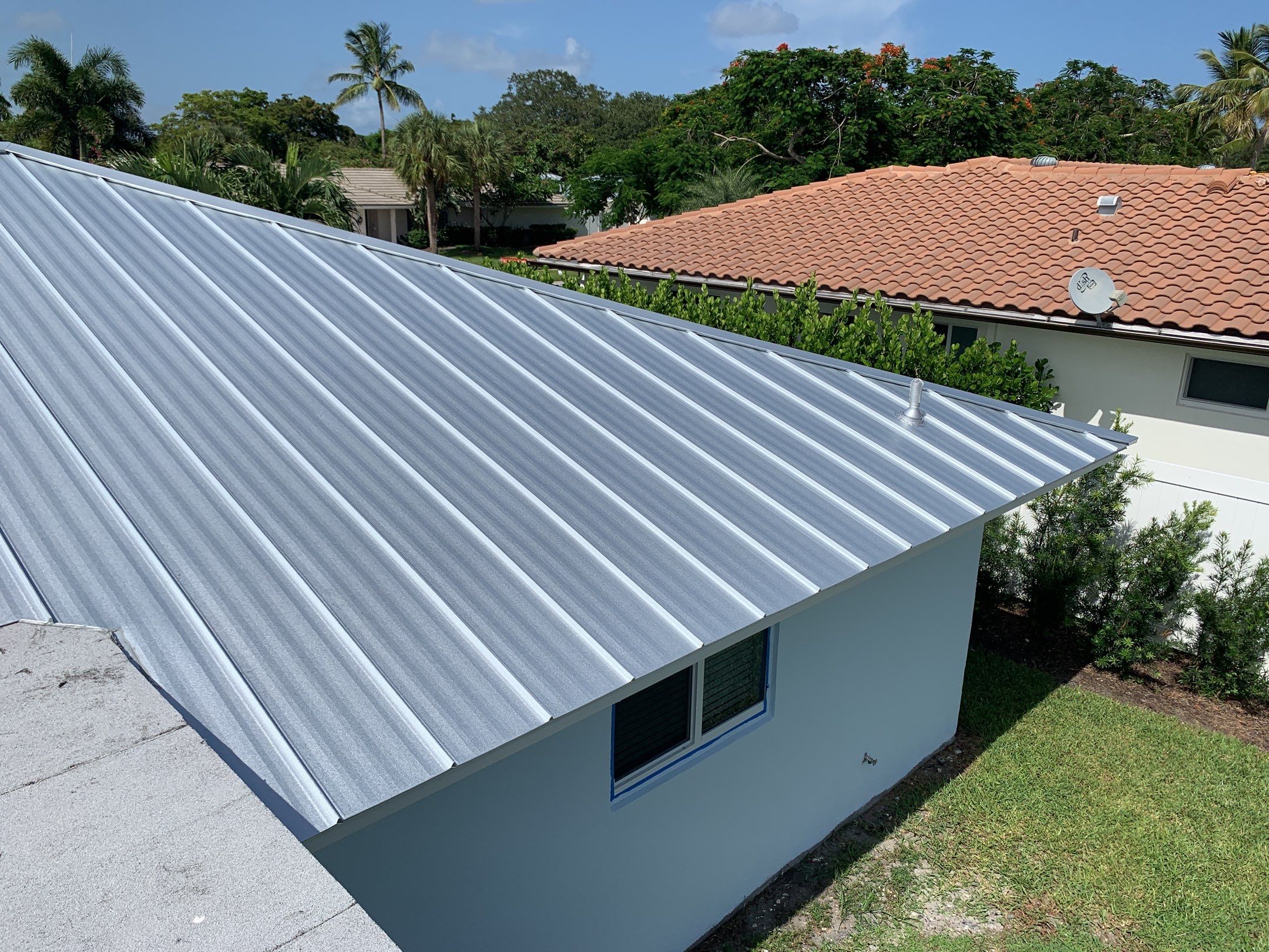 Residential Roofing Installation using 1" Nail strip metal roof by BLUES BROTHERS ROOFING