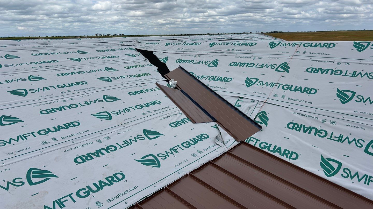 Metal roofing installation using Standing seam metal roofing system by Straight Edge Roofing Inc