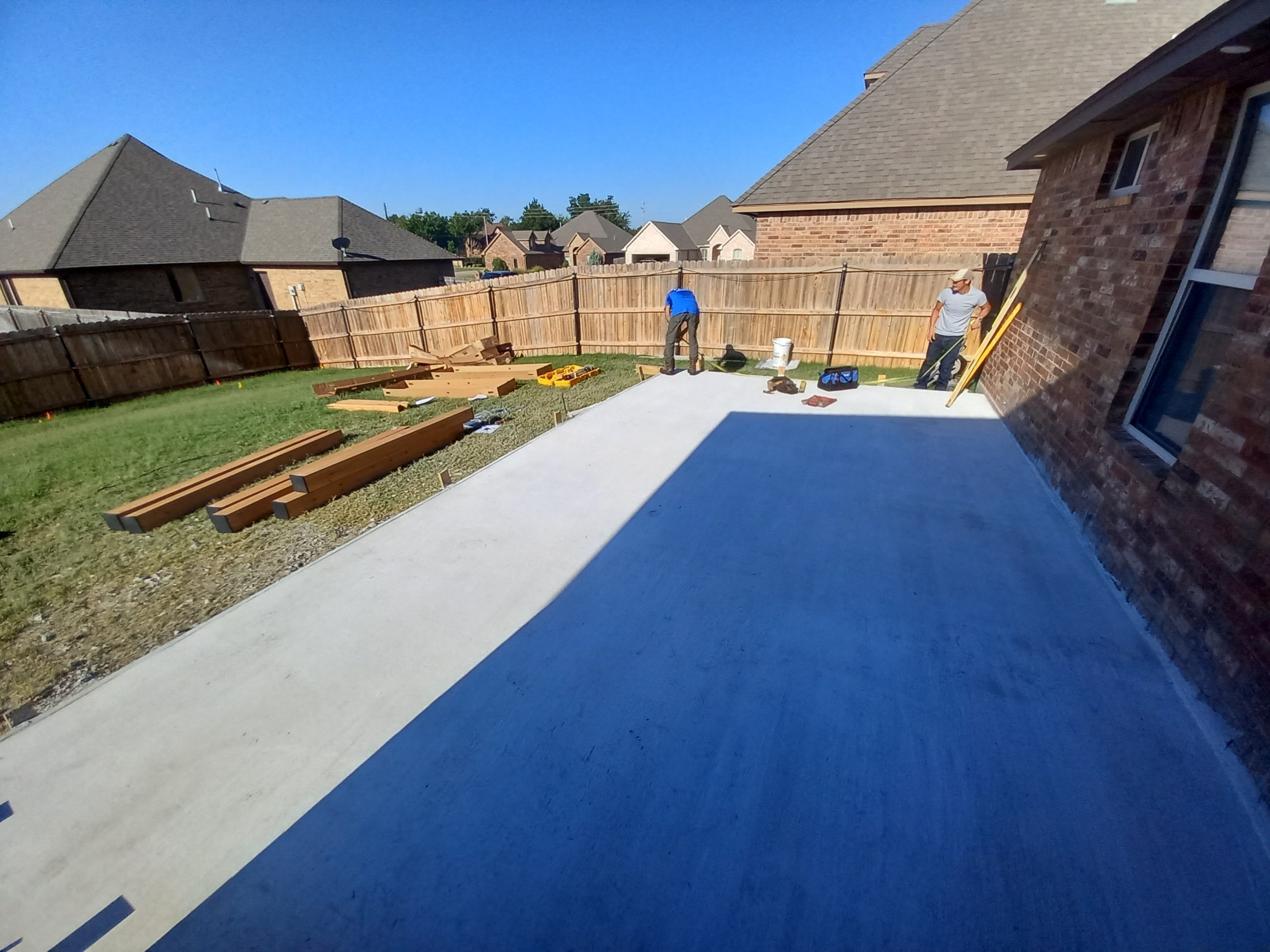 Concrete slab with Pergola by Clays Services Inc