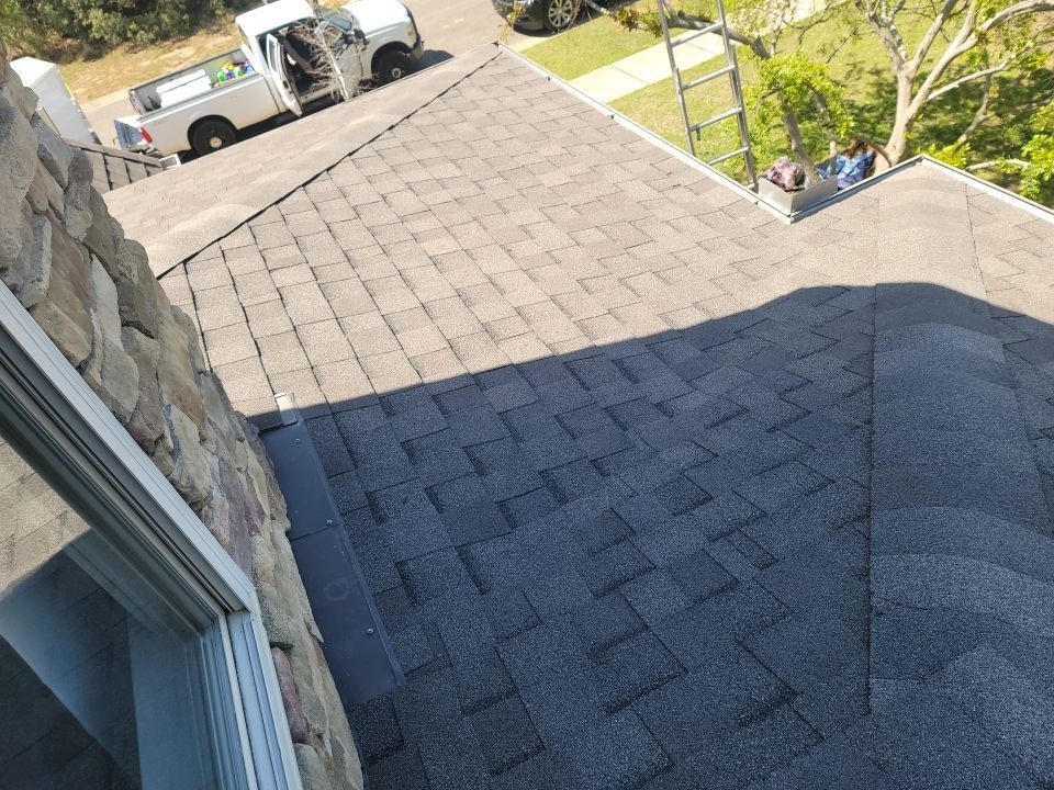 Residential Roofing Installation using Roof Replacement by American Roofing & Construction LLC