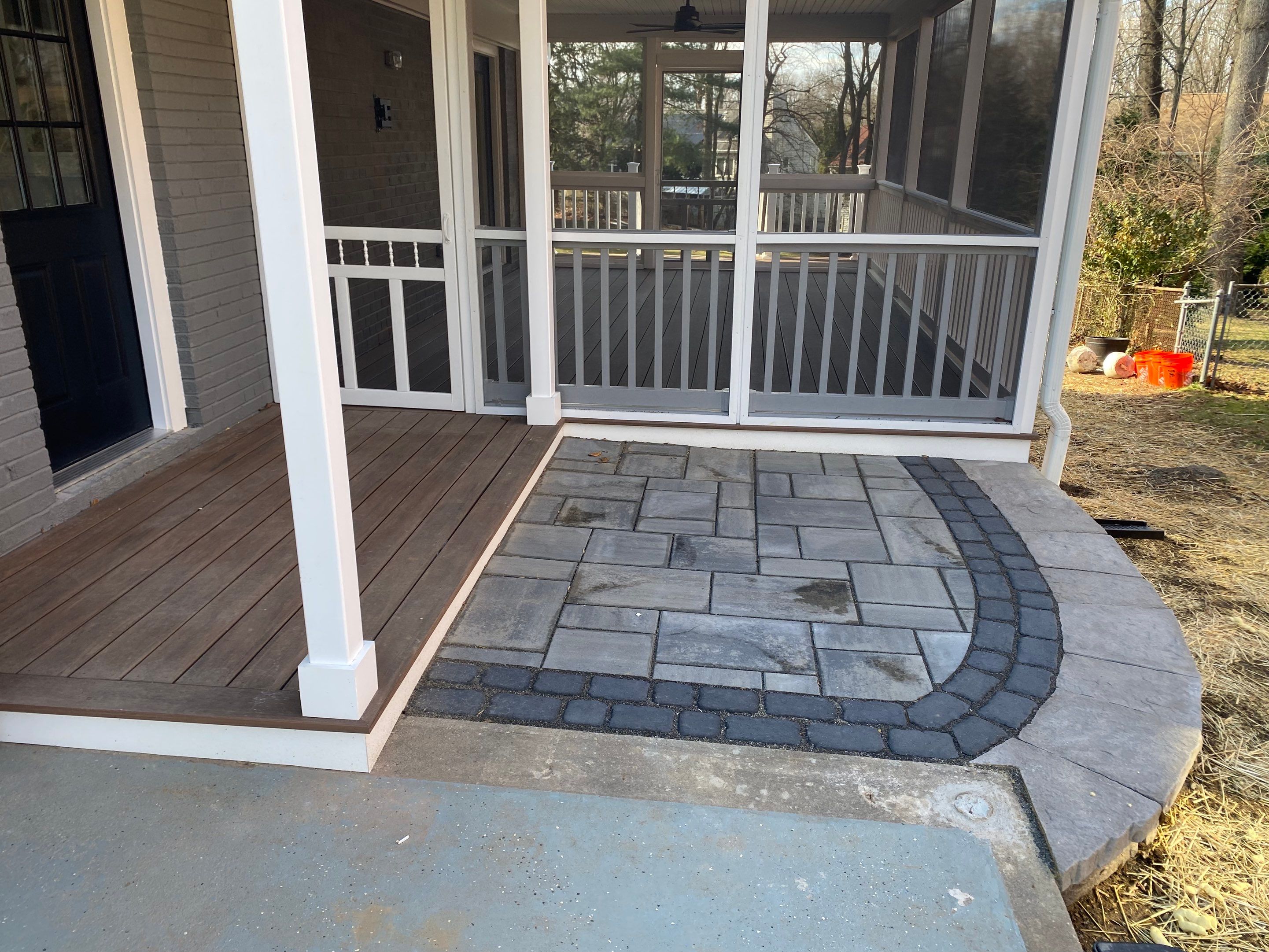 Retaining wall, walkway, small patio and landscape install by The Smet Companies, LLC