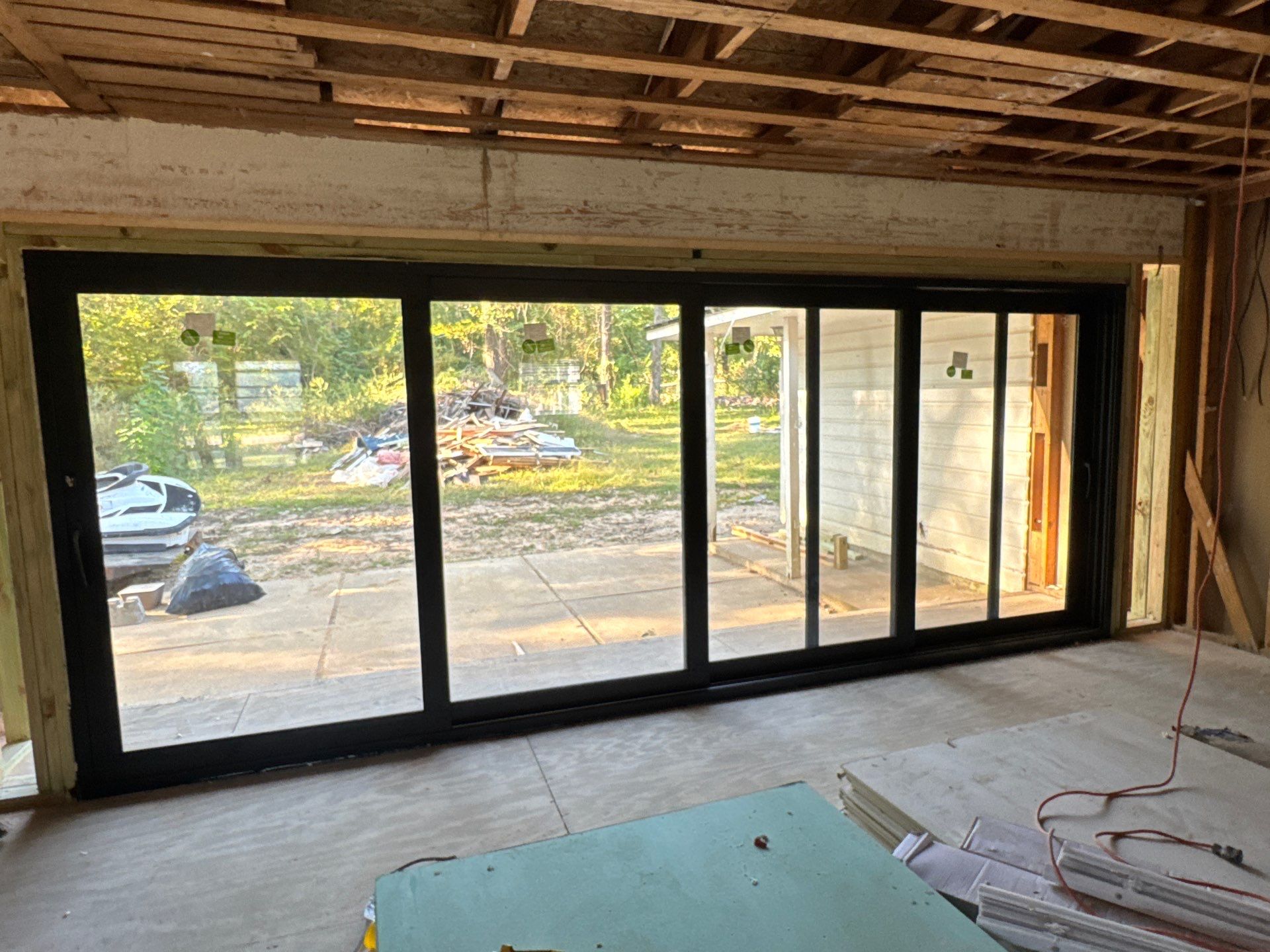 Panoramic Grandeur: 16-Foot Wide Architectural Sliding Door Installation by Tibi Soli LLC