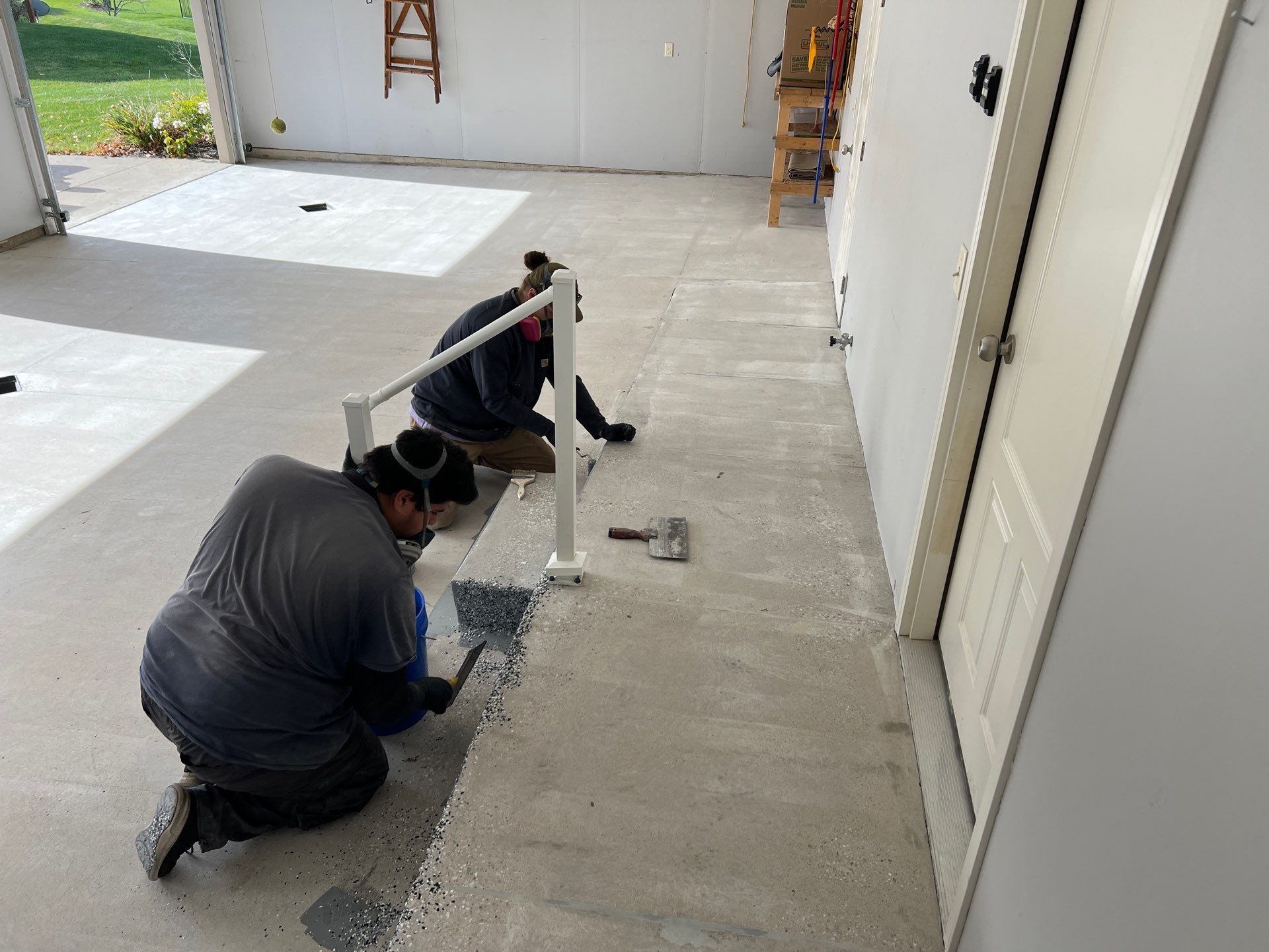 Custom Grey Speckled Epoxy Floor Installation in Grand Rapids by Gordon Painting