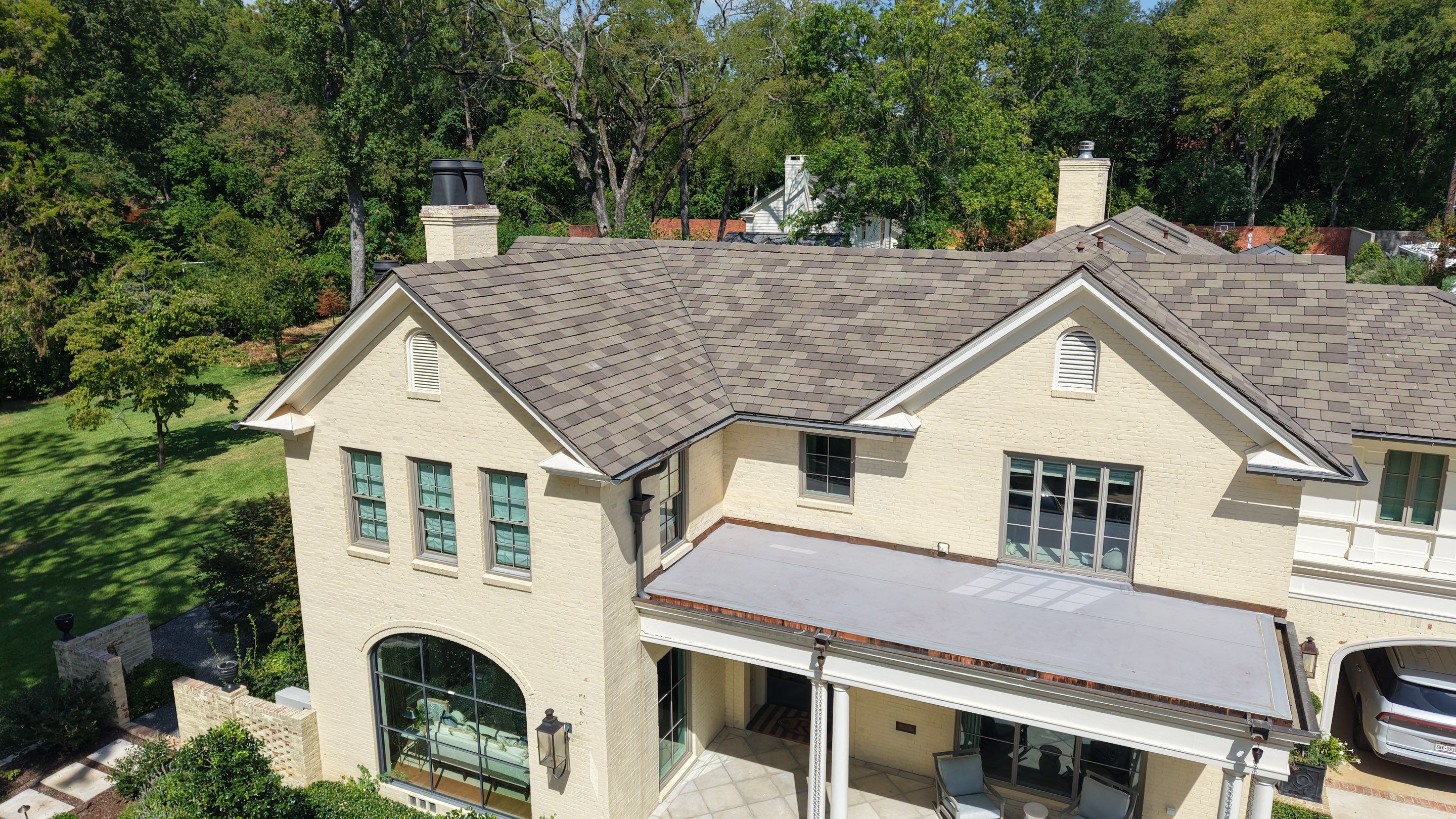 Residential Re-Roof for Flat Portion using Mule Hide .60 TPO by TEC Roofing