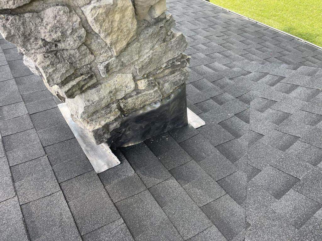 Storm damage roof replacement by Nitro Roofing and Construction