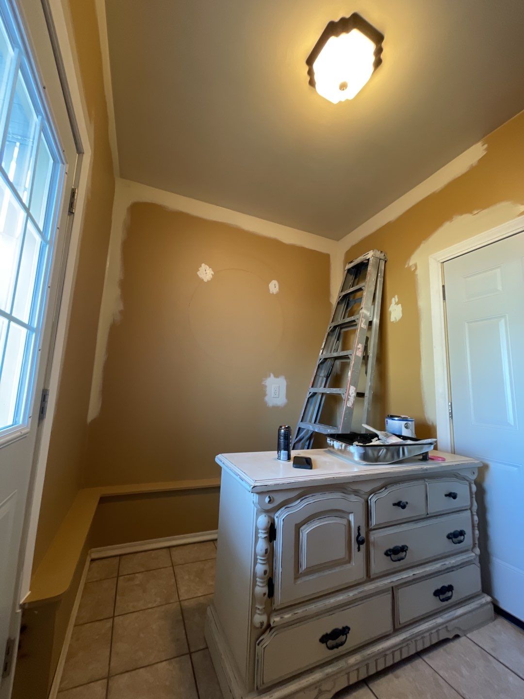 Painting Kitchen Cabinets and Walls using Sherwin Williams paint by Lightning Exteriors