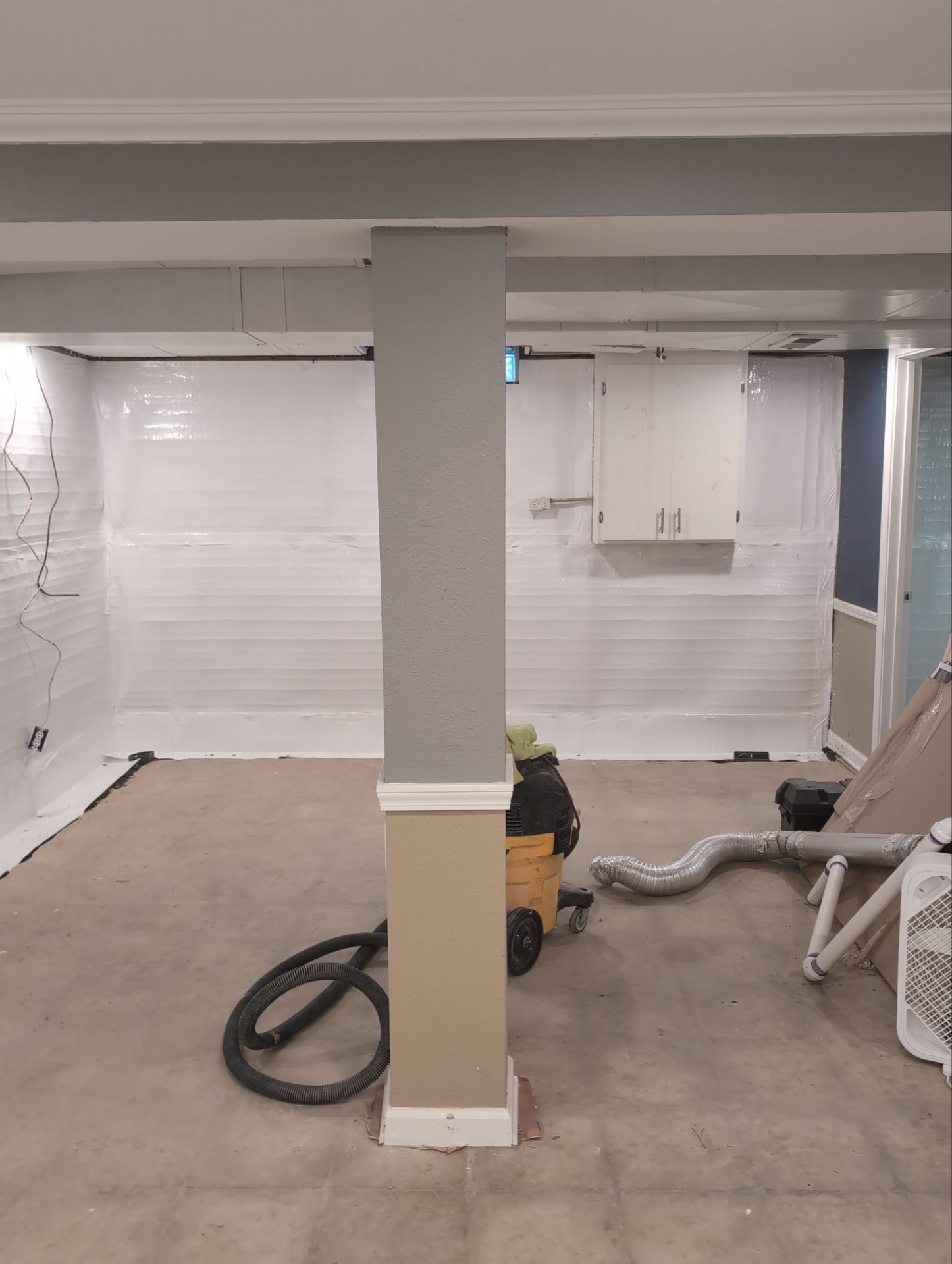 Interior Basement Waterproofing System and Egress Window Installation by Toledo Basement Repair 