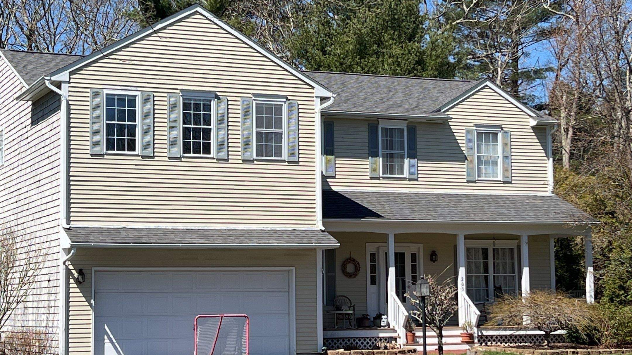 Pewterwood Roofs by Pinnacle Roofing & Skylights