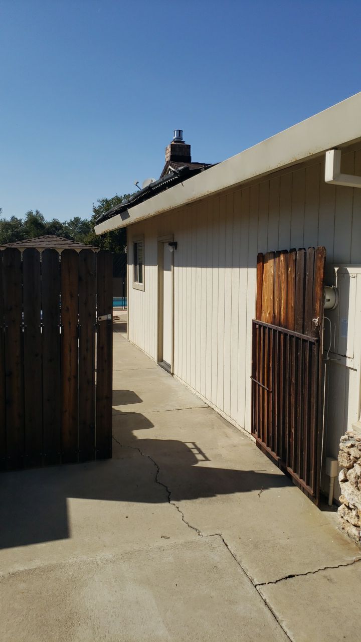 Roofing and Gutters to protect this home by Byers Enterprises