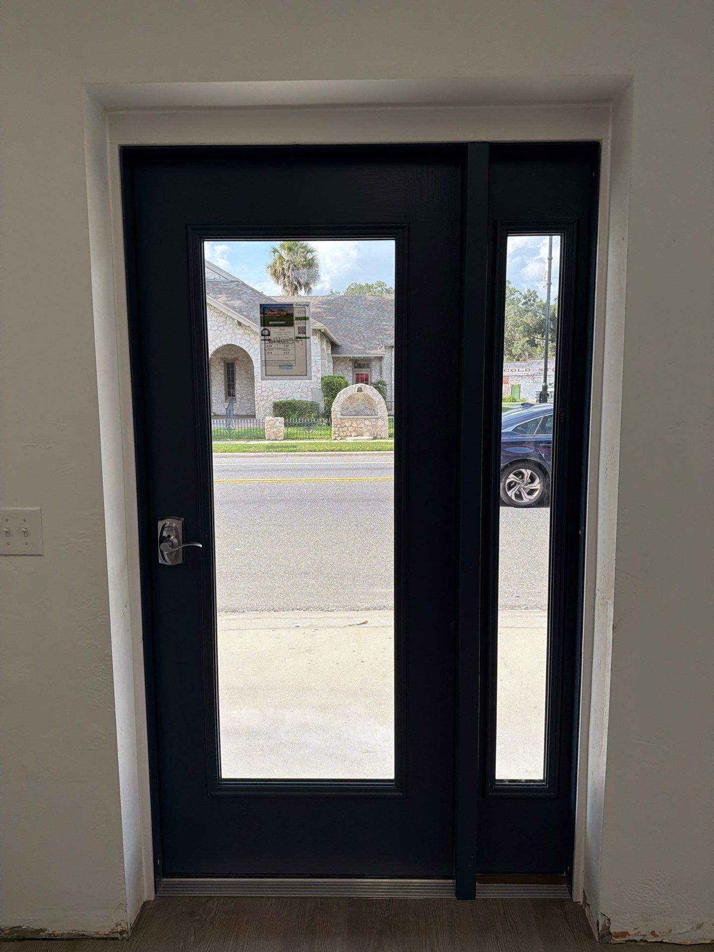 Commercial Entry Door Upgrade with ProVia Sidelight in Newberry by Windows & Doors Store