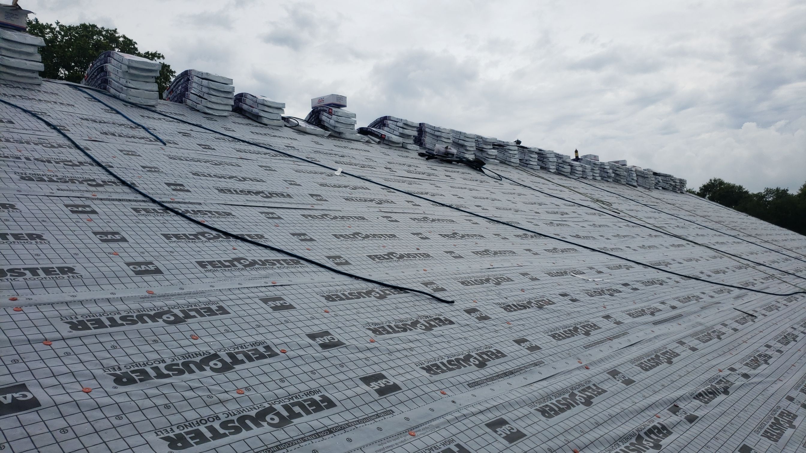 Residential Roofing Installation using Roof Replacement by American Roofing & Construction LLC