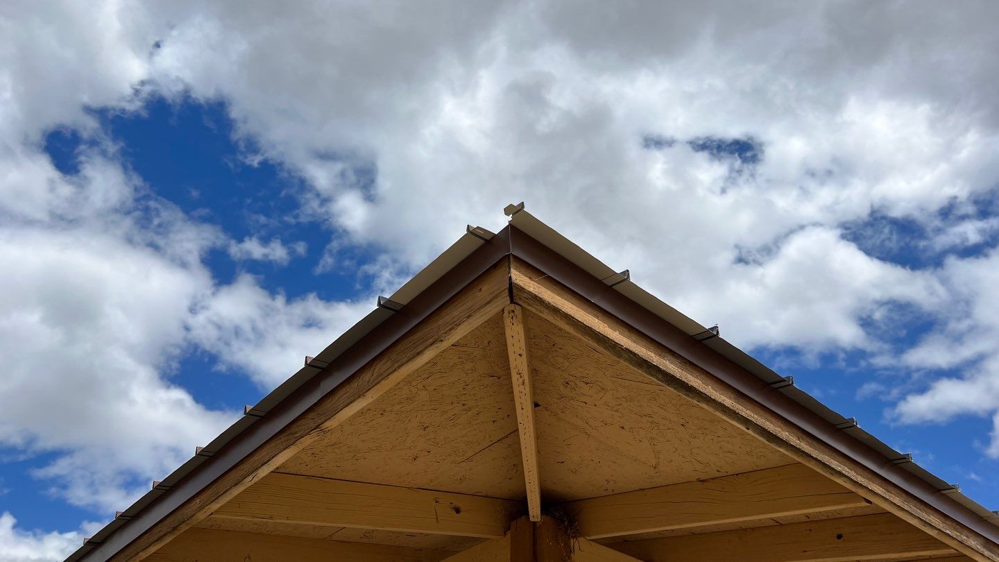 Metal roofing installation using Standing seam metal roofing system by Straight Edge Roofing Inc