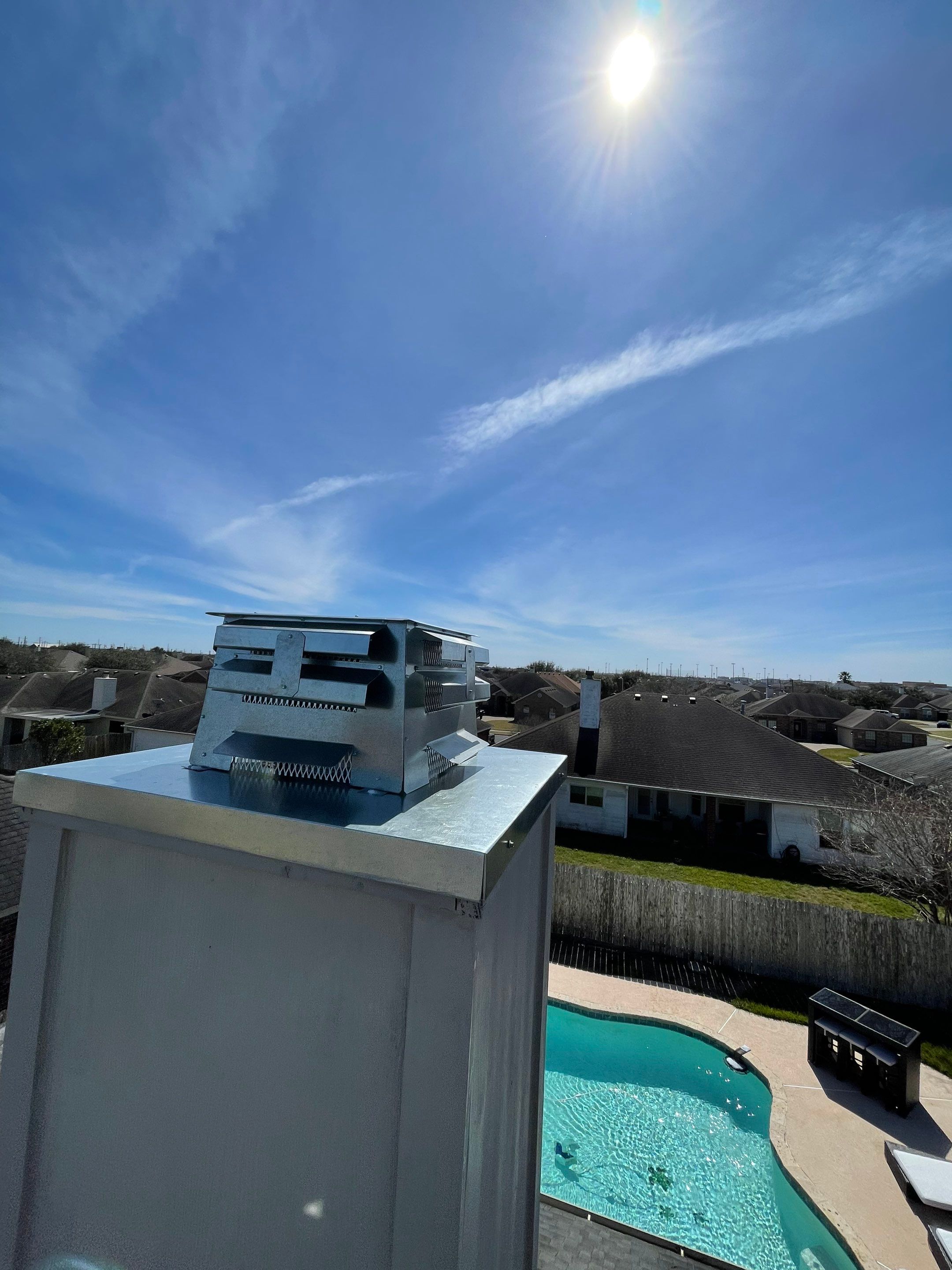 Residential Roofing Repair Replacing Chimney Cap by Lighthouse Roofing