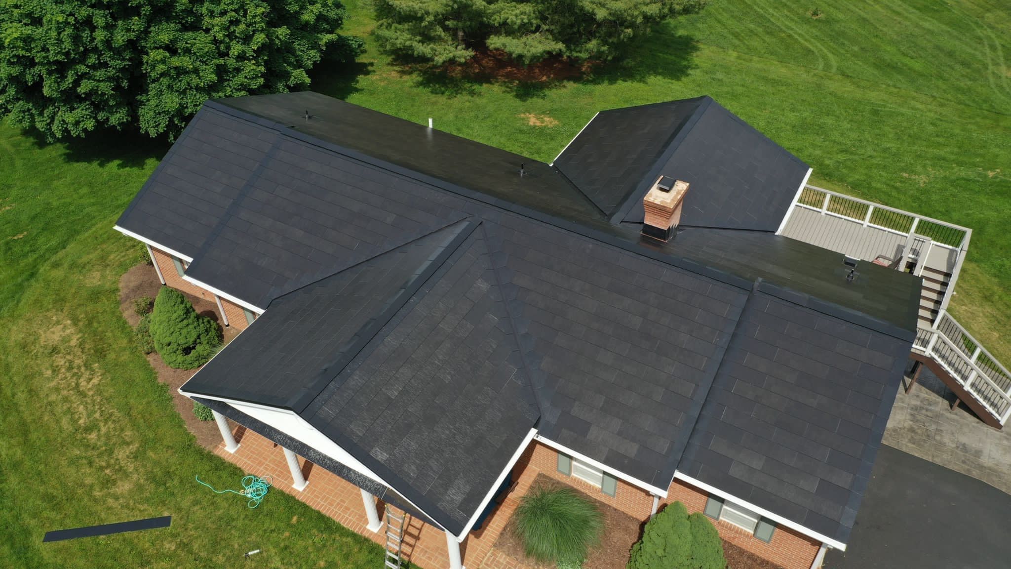 Tesla Solar Roof Installation by American Home Contractors