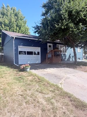 Dark Blue Exterior Painting and Trim Refresh in Sioux Falls