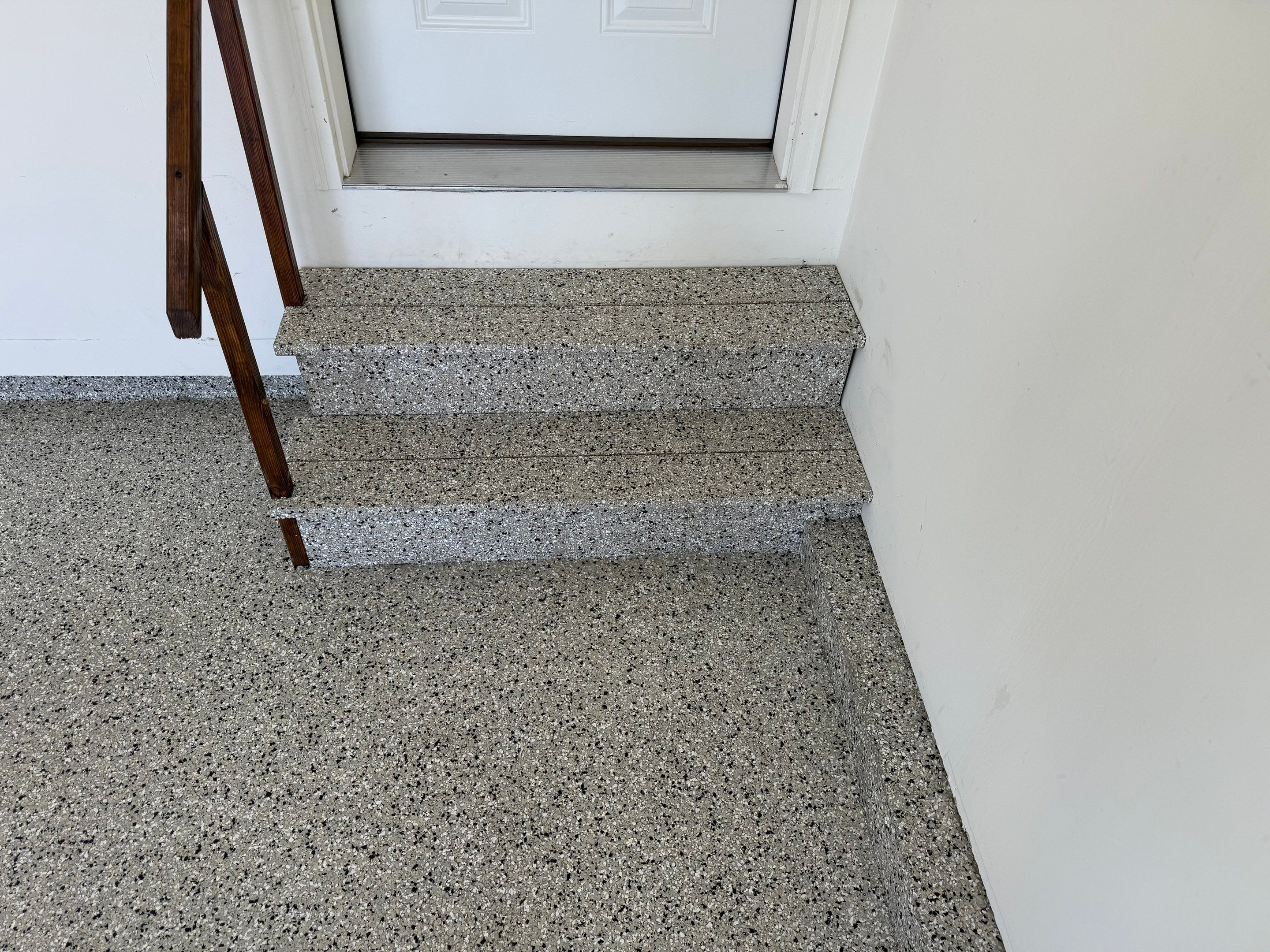 Cabin Fever Garage Floor Coating in Sioux Falls by Select Painting, Coatings & Garage Cabinets