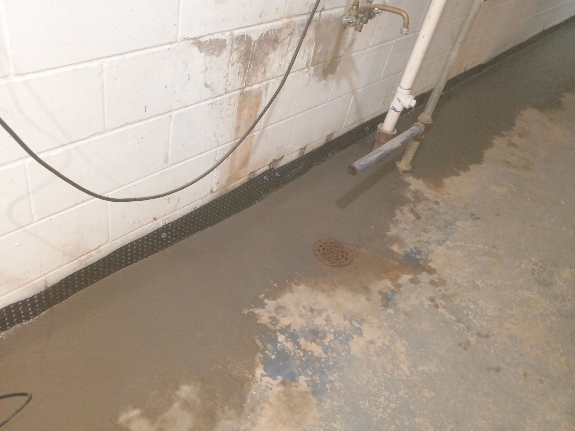 Interior Drain Tile Installation in Columbia Heights, MN by Waterproofing Northeast