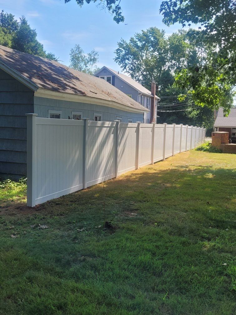 Vinyl Privacy fence White by DiGiorgi Roofing and Siding Inc