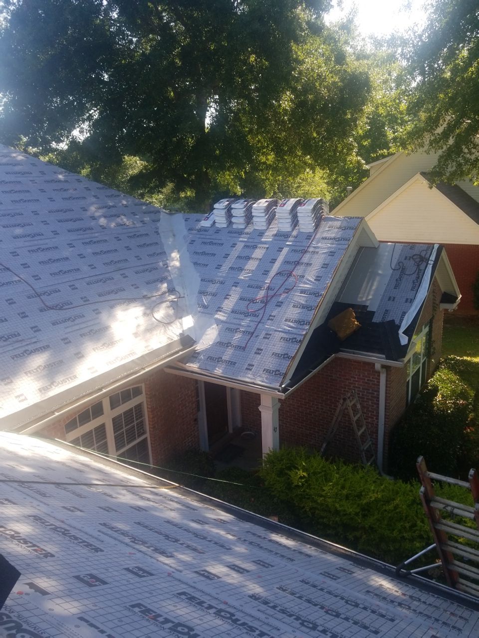 Residential Roofing Installation using Roof Replacement by American Roofing & Construction LLC
