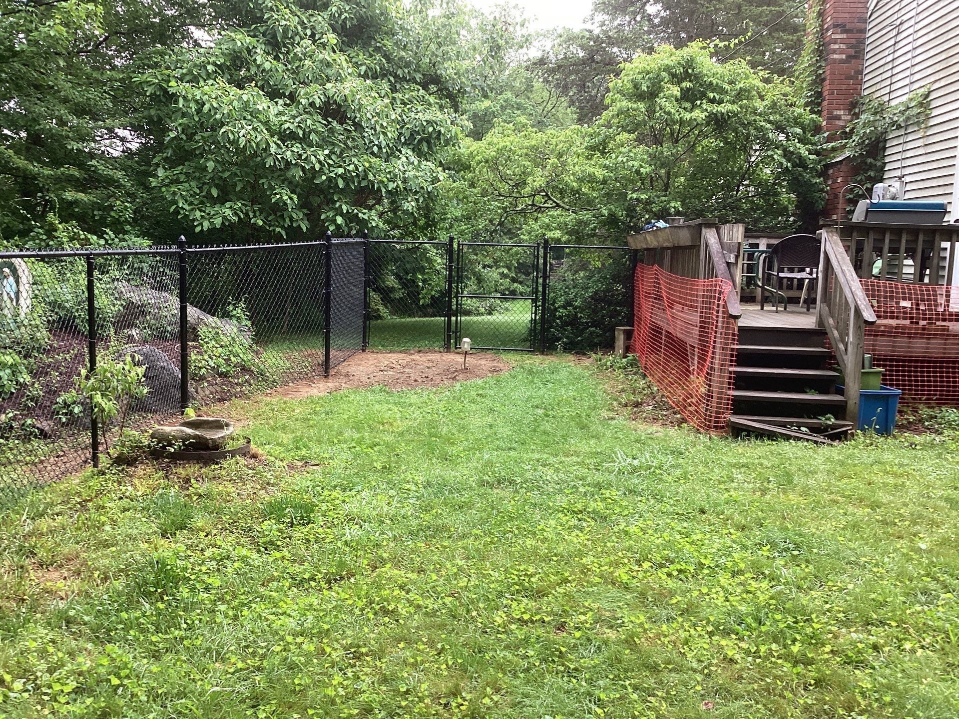 New Black Chain link fence with matching gate.  by DiGiorgi Roofing and Siding Inc