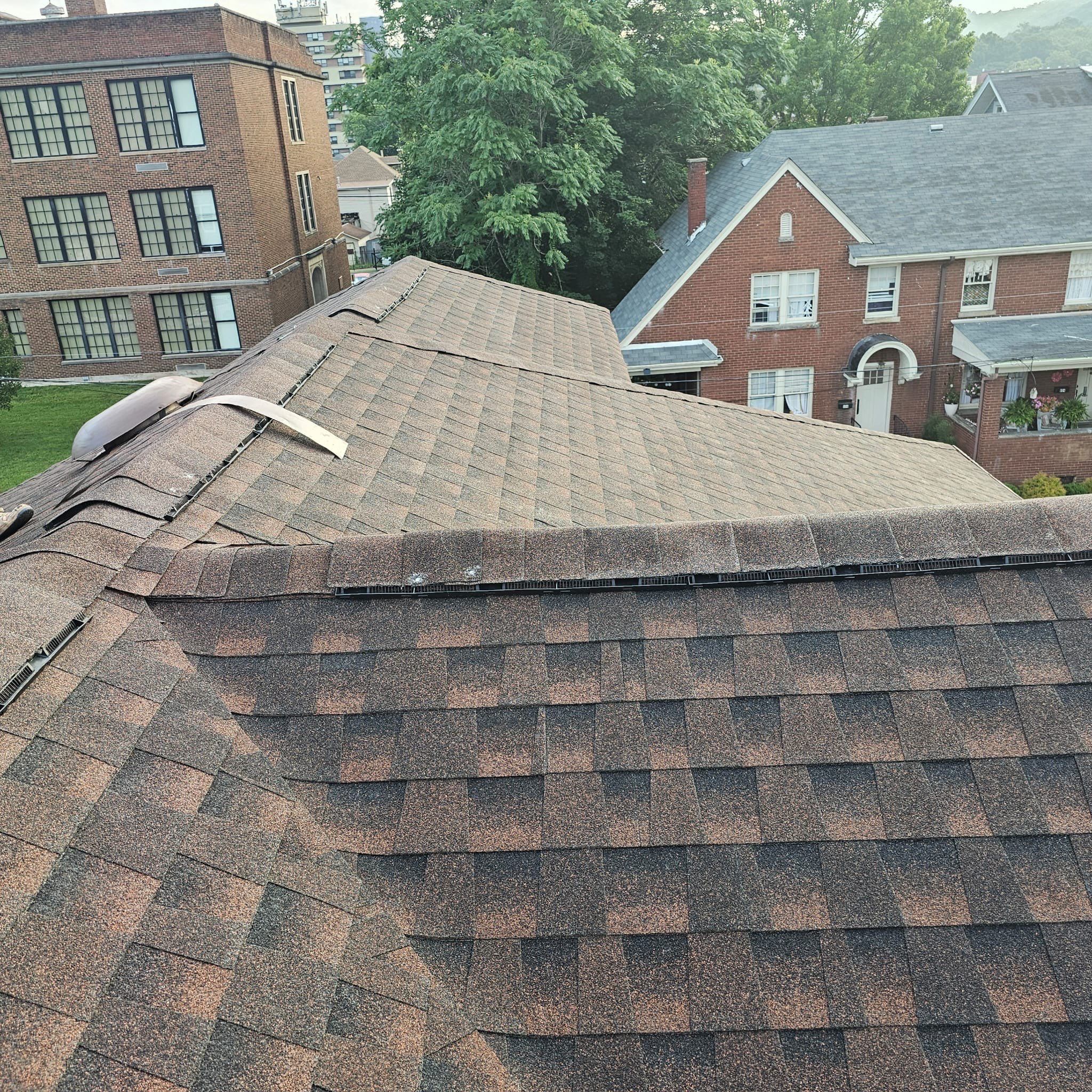 Residential Roofing Installation using GAF TImberline HDZ Hickory by Rainstoppers Roofing