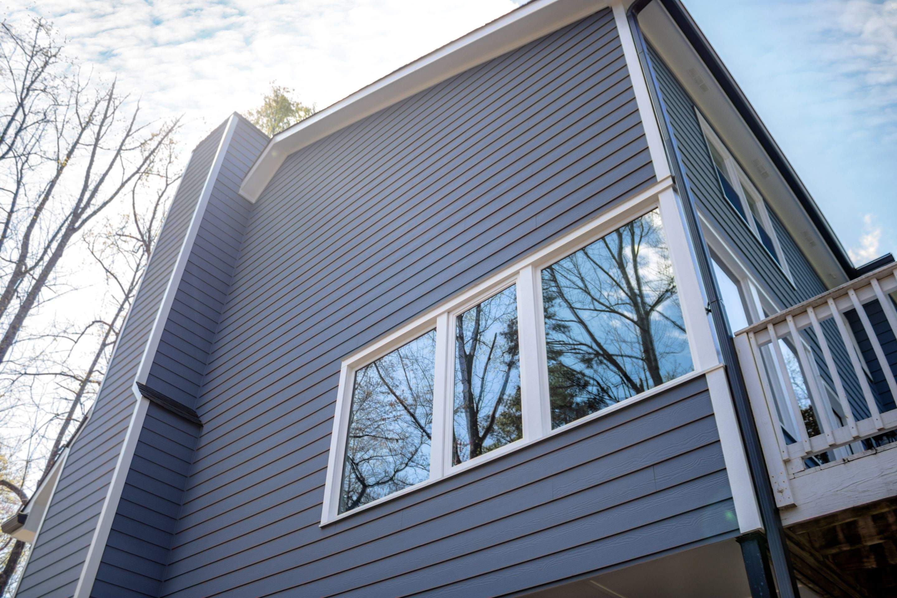 Marietta, GA Full Siding Replacement, 30+ Window Replacements, Screened-In Porch to Sunroom Conversion, Gutter Replacement, and Exterior Painting by Nelson Exteriors