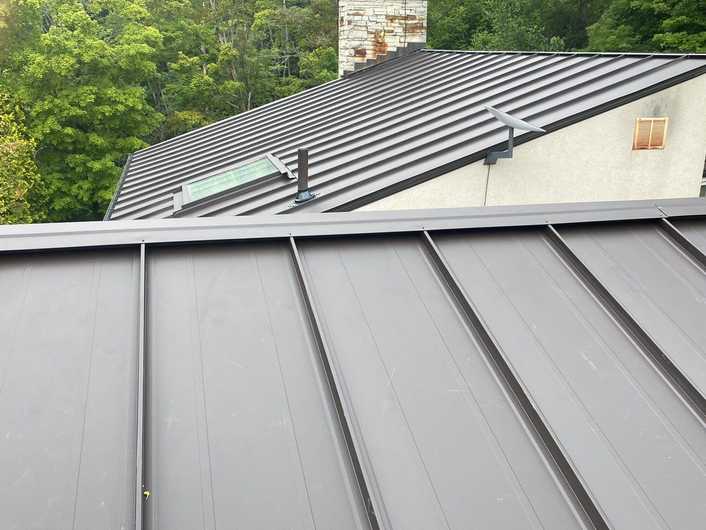 Roof Replacement using 16" Standing Seam Panels by Jay Carter Roofing & Sheet Metal