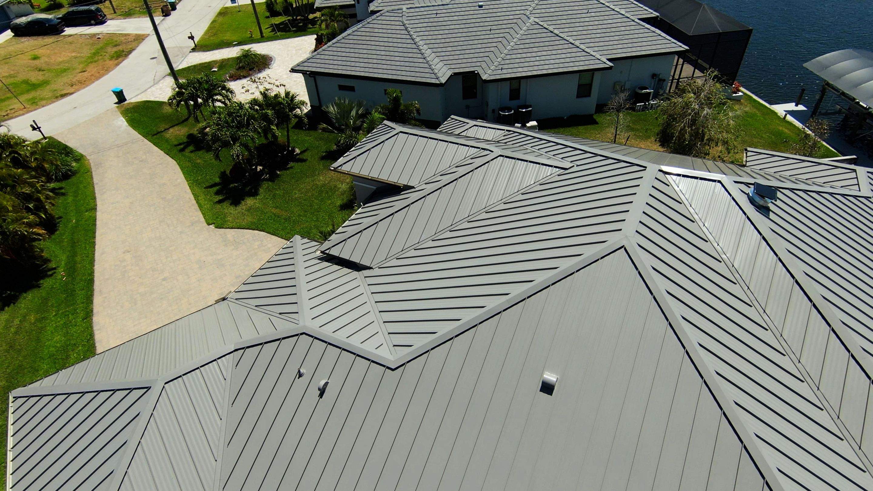 Residential Roofing Installation using Gulf Coast Metals Gulf Seam Panels by Four Peaks Roofing