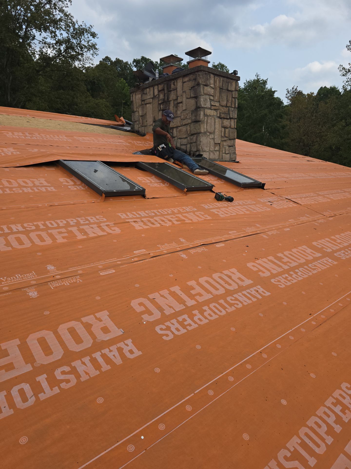 Residential Roofing Installation using Metal by Rainstoppers Roofing