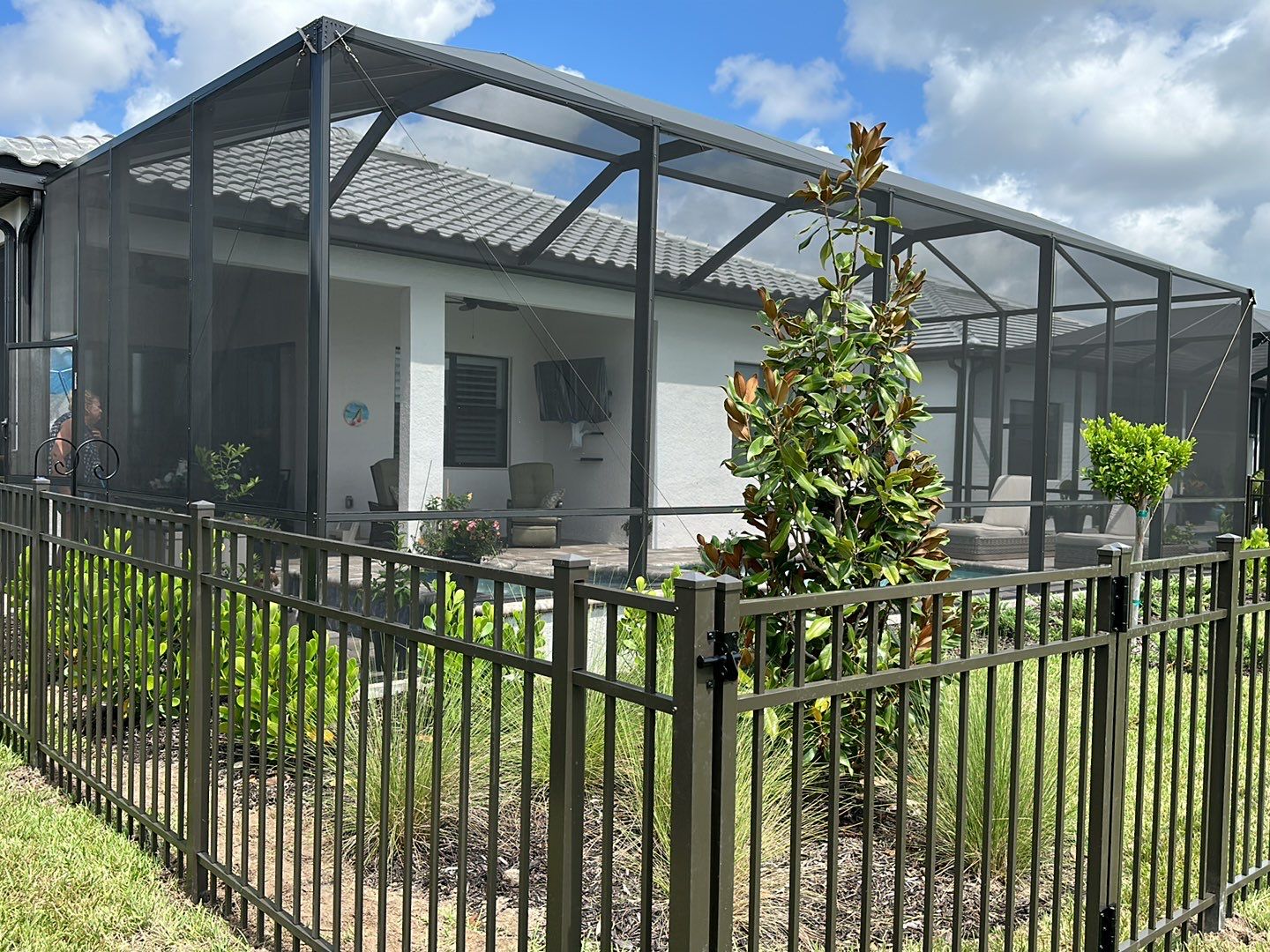 Aluminum Fence Installation using Bronze 3 Rail Aluminum Fence by Asap fence and gates, LLC