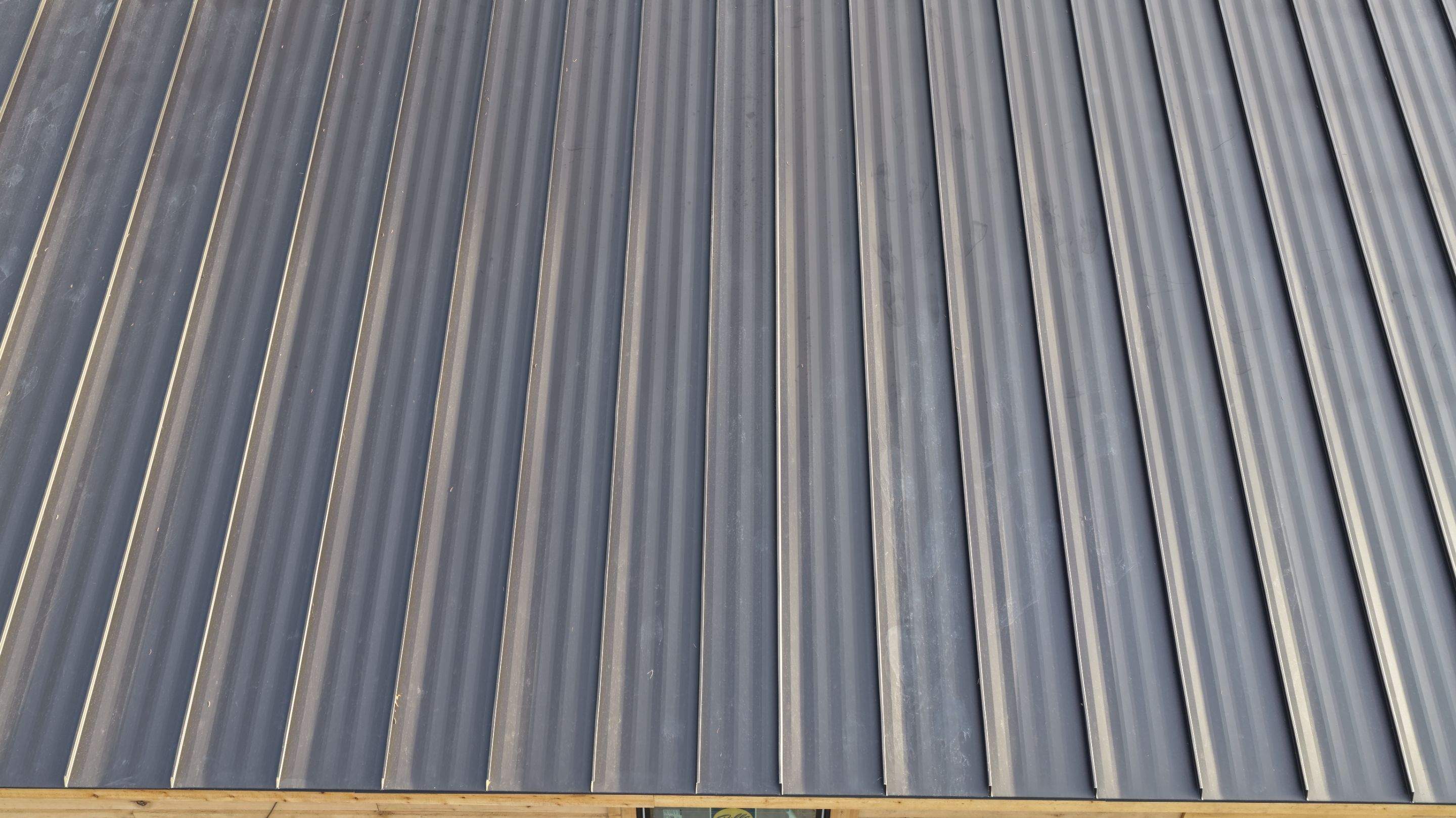 Mechanical Lock Standing Seam - CMG ULG Dark Bronze  by Montana Roofing Solutions