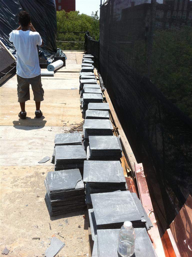 Historic Building ROOF REPLACEMNT with GAF TruSlate  on steep slop and Versico 60mil TPO on flat roof by Gorilla Exteriors Contracting, LLC