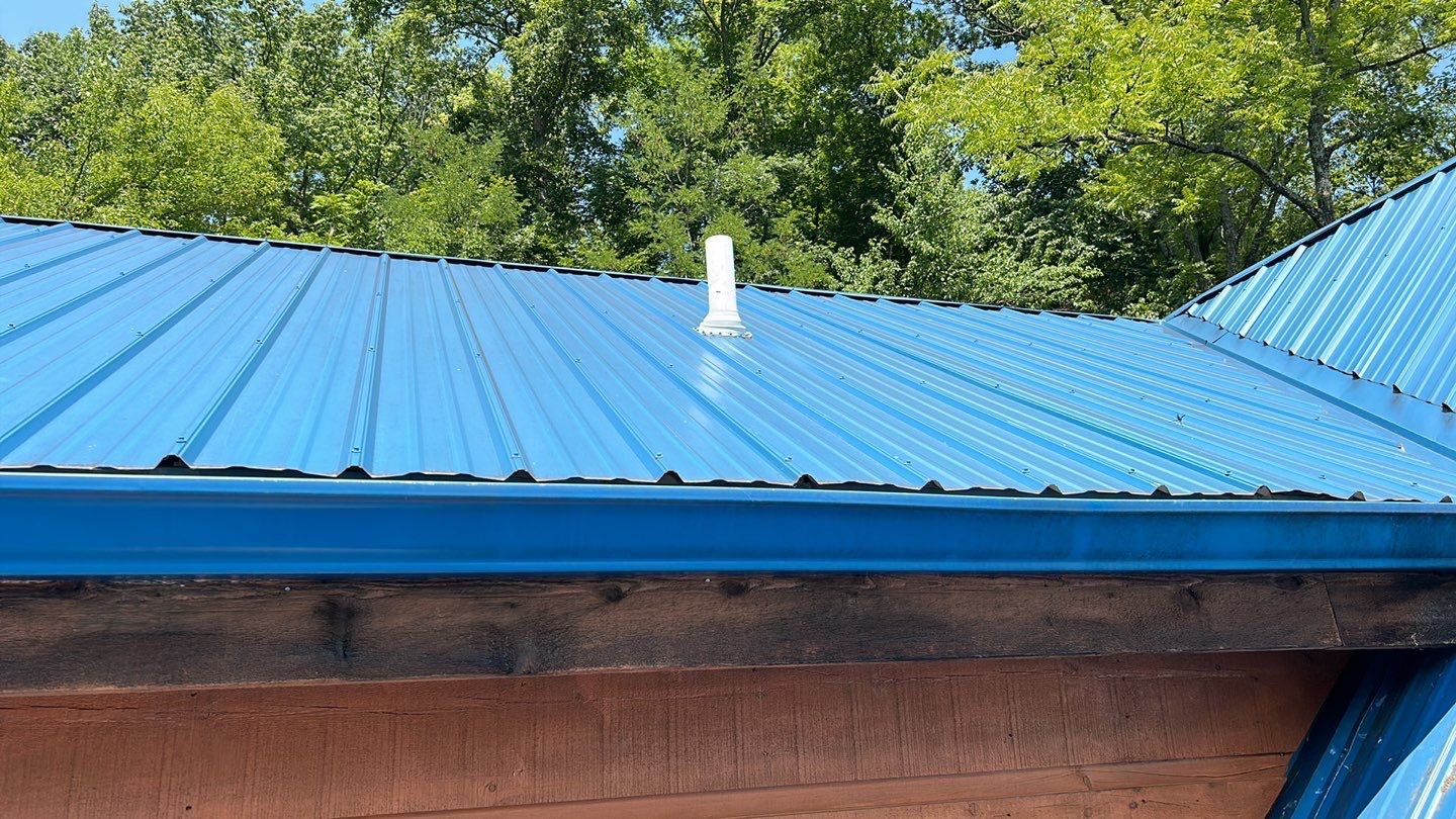 Residential Roofing Installation using Standing Seam Metal - Gallery Blue by RoofX 