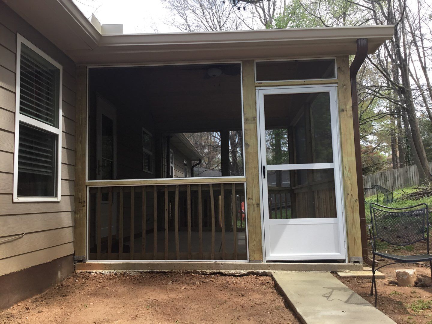 Screened Porch Construction with Vaulted Wood Ceiling in Douglasville by Swift Home Renovations
