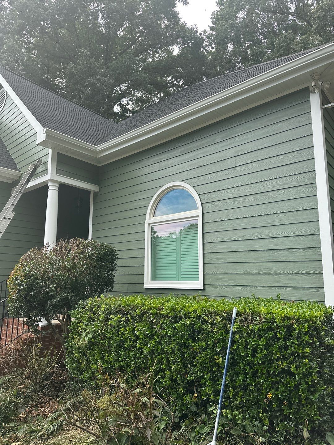 Raleigh Siding and Window Replacement with Custom Green Finish by The Remodeling Company