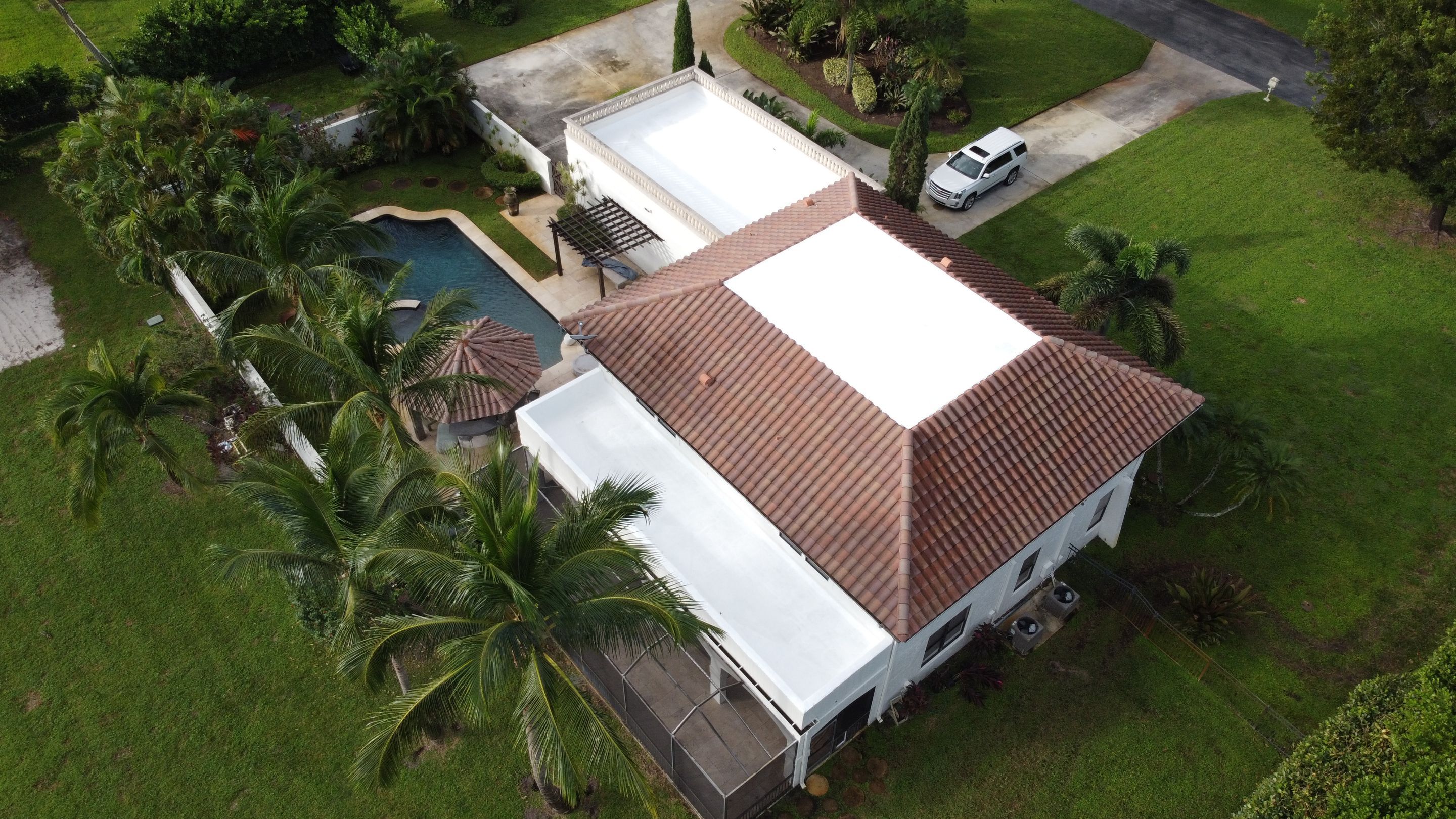 Residential Roofing Installation using Polybrite 90.1 silicone coating by BLUES BROTHERS CONSTRUCTION CORP