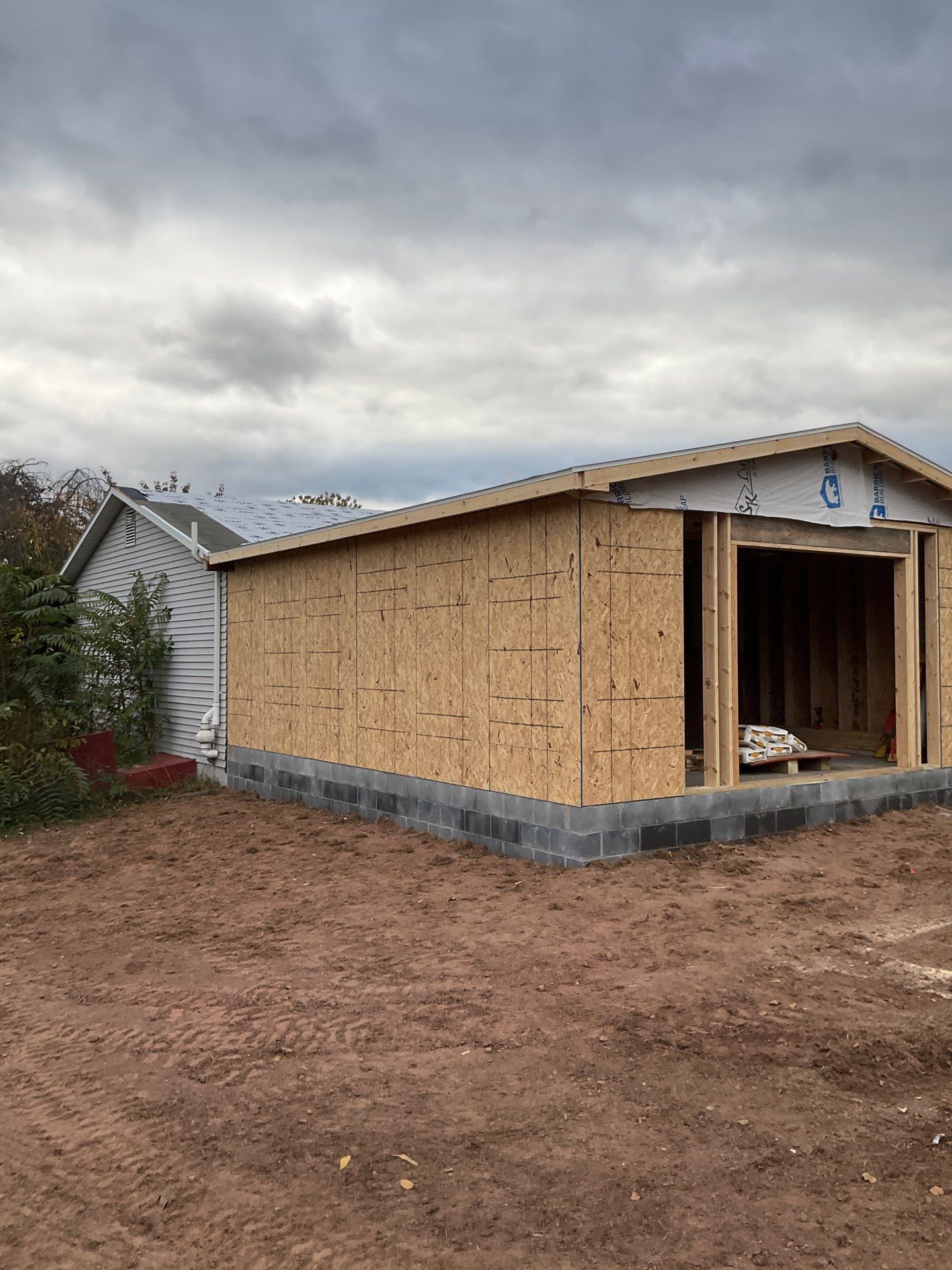Residential Addition and Covered Porch Roof  by Esh Builders