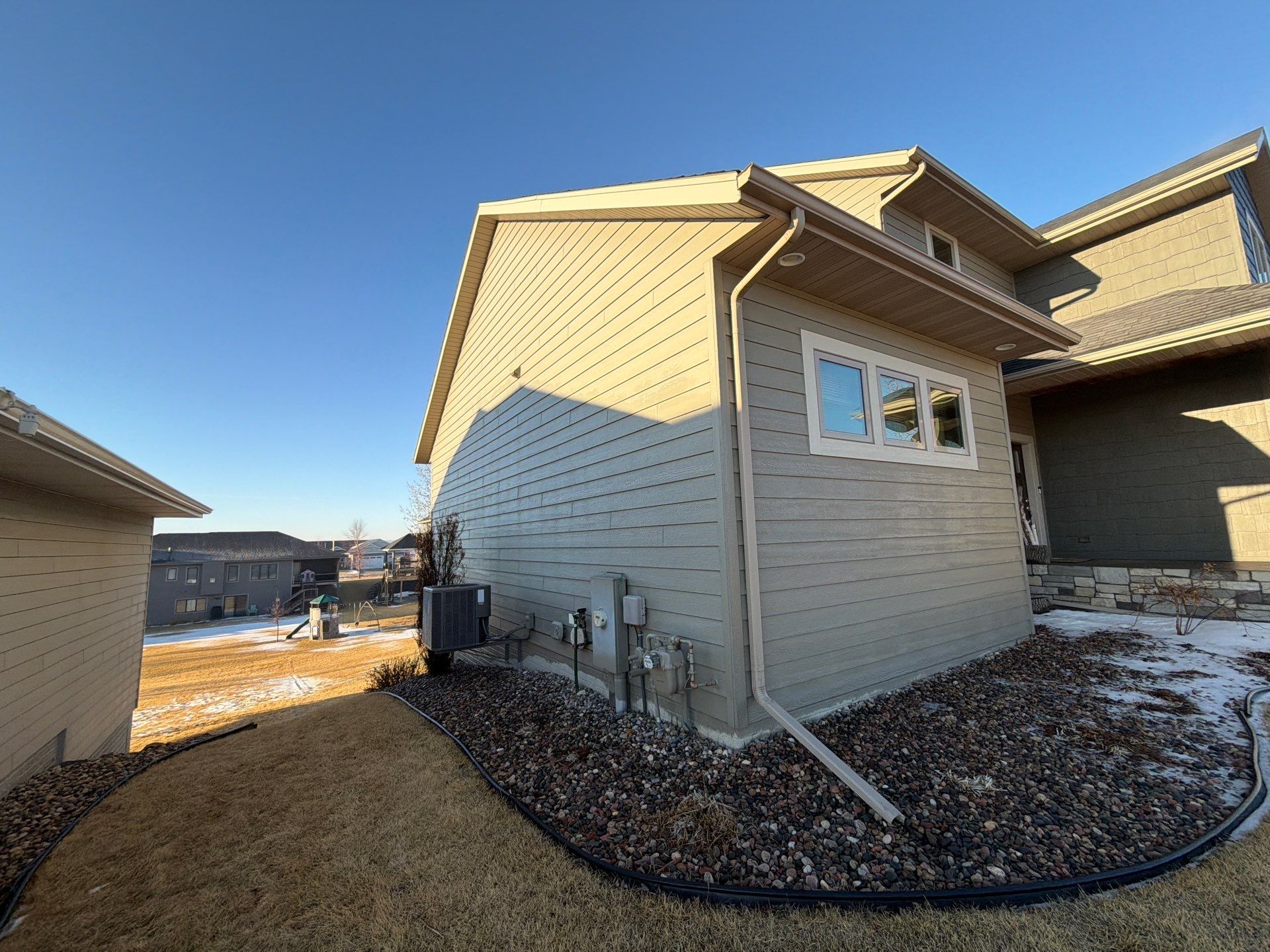 Residential Exterior Painting and Color Update in Sioux Falls by Select Painting, Coatings & Garage Cabinets