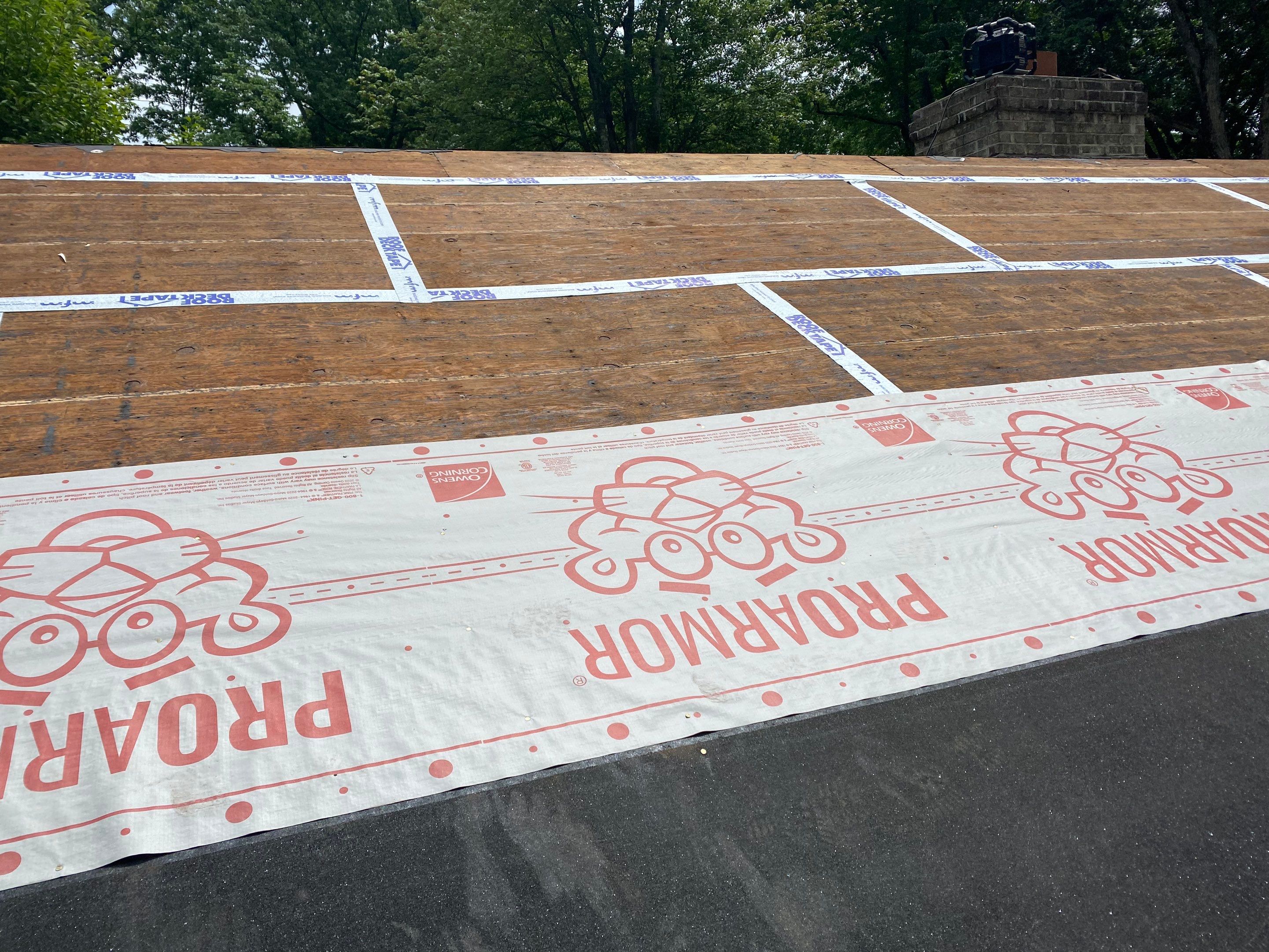 Commercial Roofing Installation using Owens Corning Duration Driftwood by A Plus Exterior