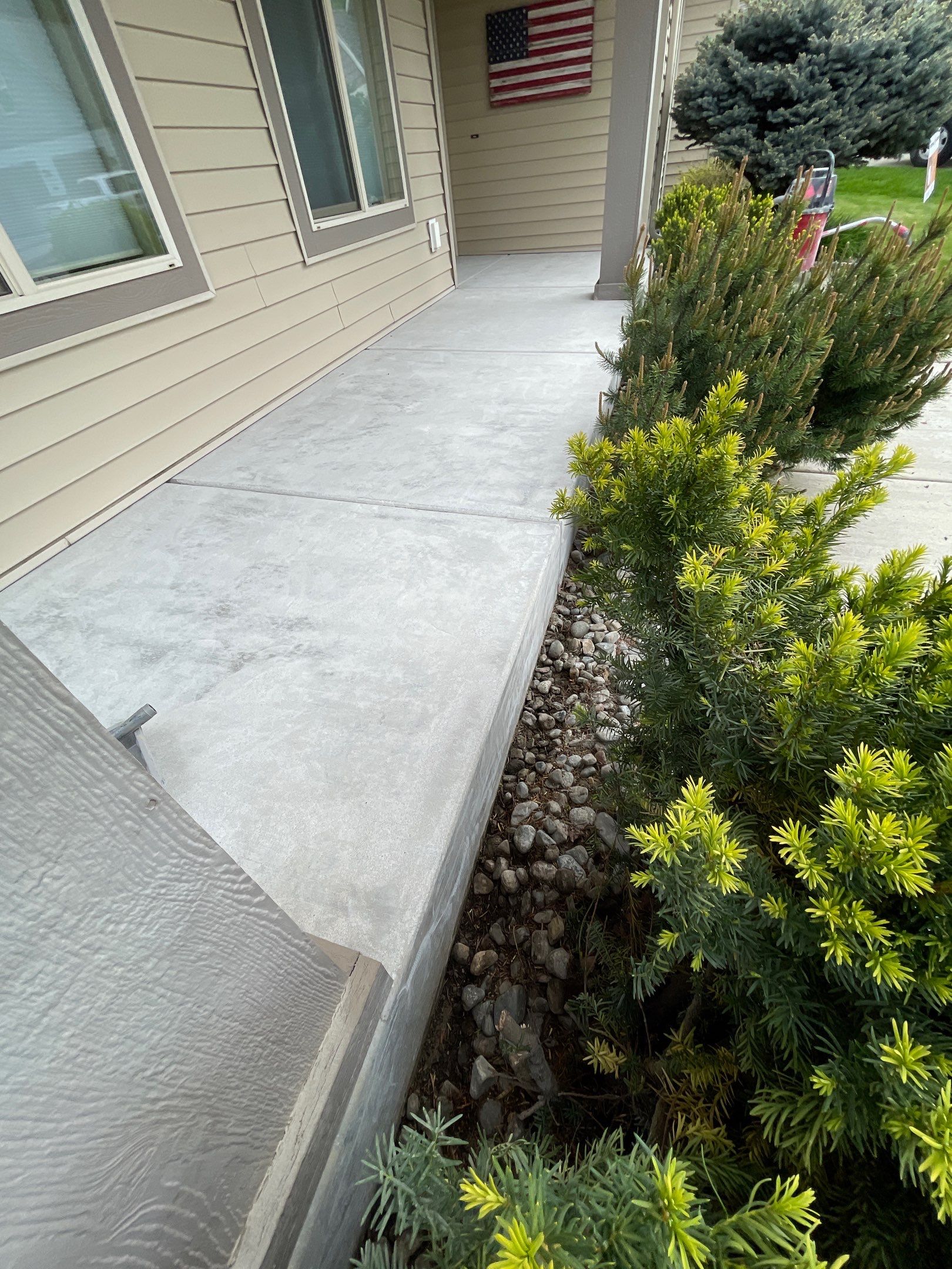 Garage Transformation using Pebble Beach and Front Porch using Greystone by Croc Coatings, LLC