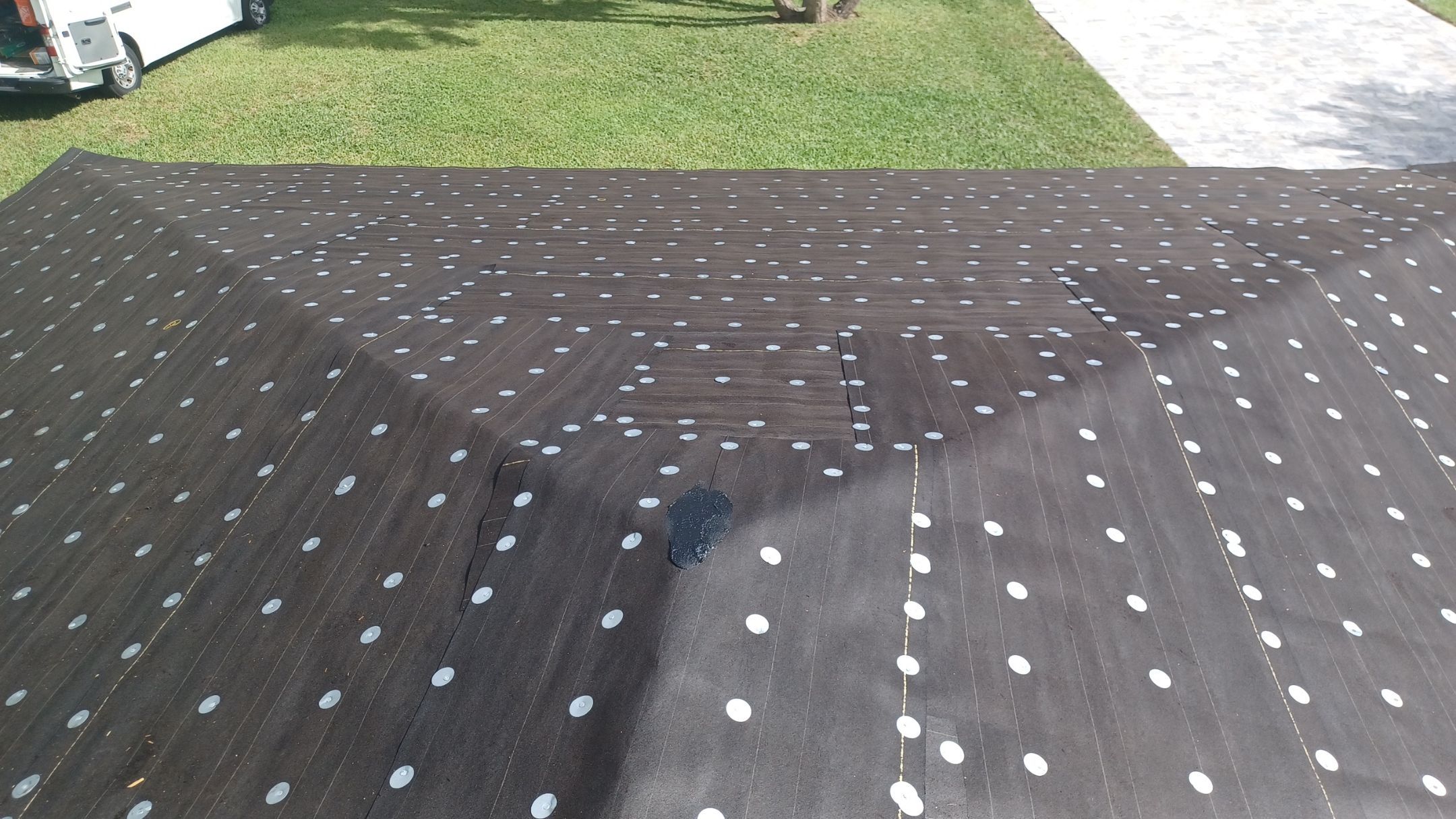 Residential Roofing Installation using 1" Nail strip metal roof by BLUES BROTHERS ROOFING