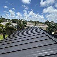 24ga 1.5" Mechanical Seam Dark Bronze by Total Roofing System The Metal Roof Experts